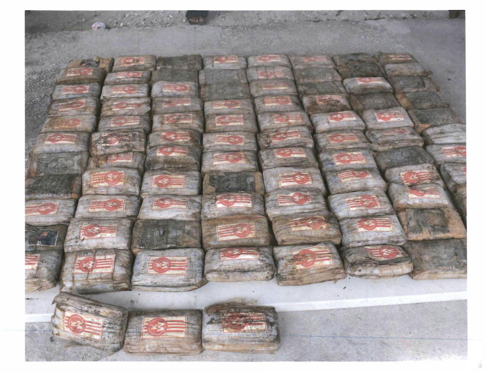 Some of the 649 one-kilo packages of cocaine discovered on a small boat that washed into Ailuk Atoll in the Marshall Islands. The cocaine was confiscated by police and incinerated in Majuro Tuesday.Marshall Islands Police Department photo