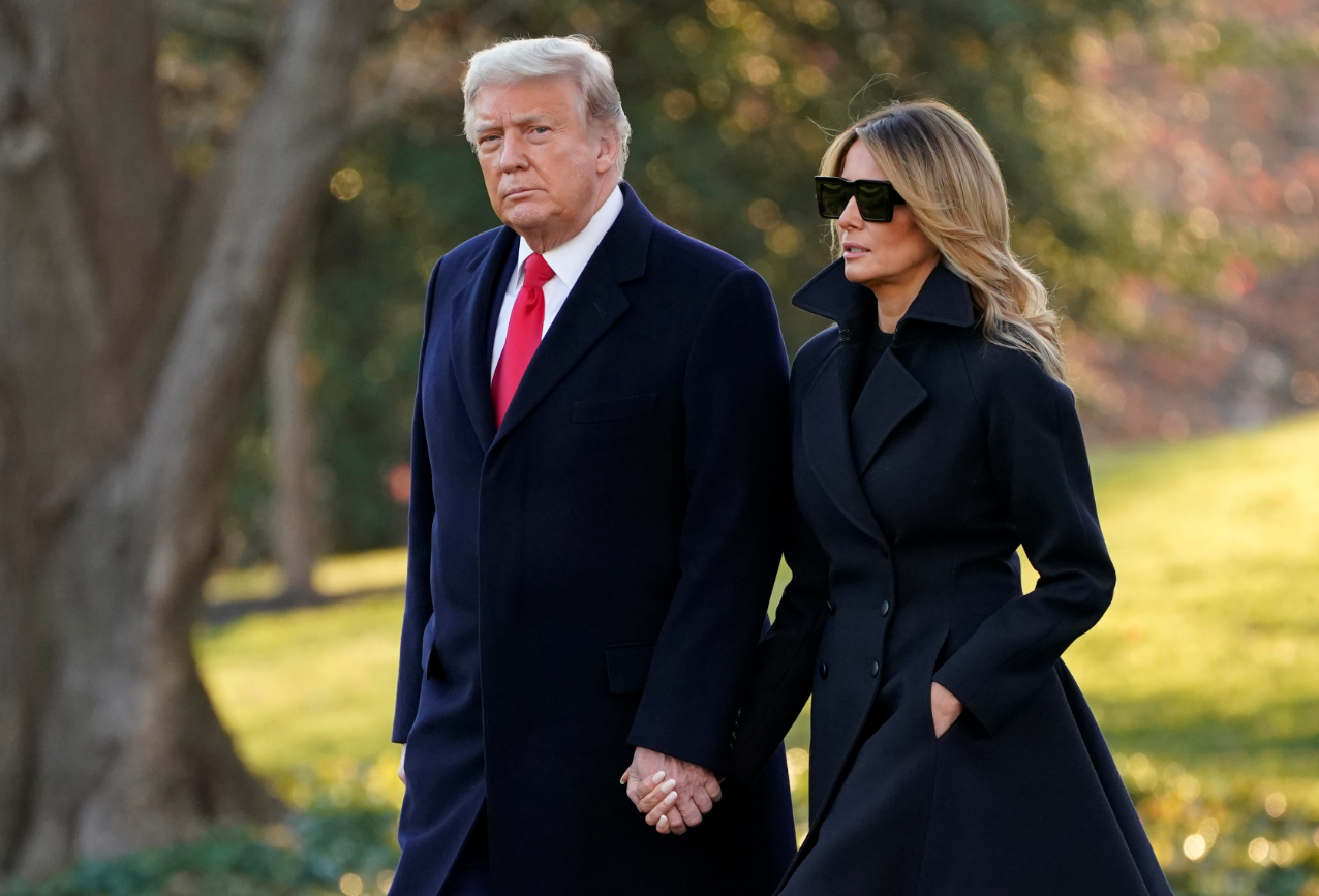 President Donald Trump and first lady Melania Trump walk to board Marine One on the South Lawn of the White House, Wednesday, in Washington, D.C.AP