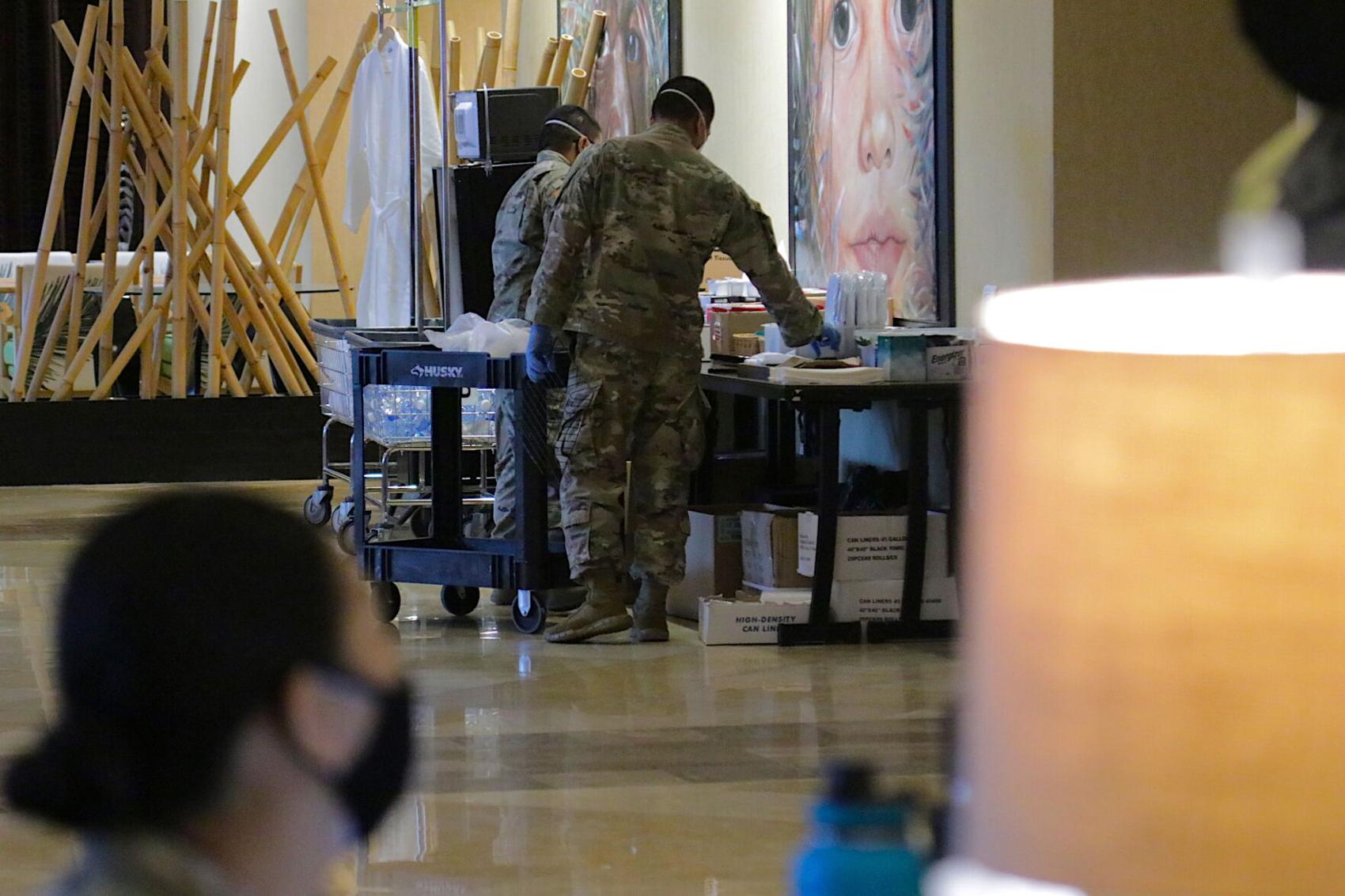 Guam National Guard soldiers package toiletries that are to be delivered to travelers in quarantine at the Dusit Beach Resort on Oct. 9, 2020.The Guam Daily Post photo