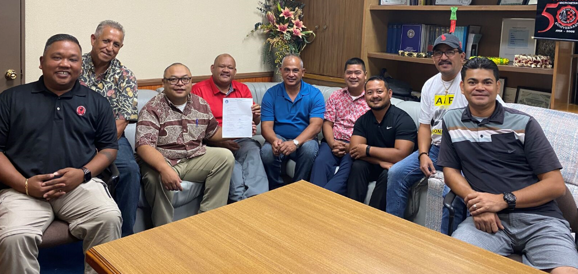 From left, Angel Demapan, Joseph Leepan Guerrero, Blas Jonathan Attao, John Paul Sablan, Joseph Flores, Ivan Blanco, Joel Camacho, Patrick San Nicolas and Roy Ada pose for a photo during their meeting in Blanco’s office.Contributed photo