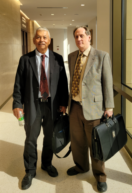 From left, former Judge Juan Lizama, who represents IPI chair Cui Li Jie, and attorney Michael Dotts, who appeared for IPI LLC during Thursday’s hearing, pose for a photo.Photo by Bryan Manabat