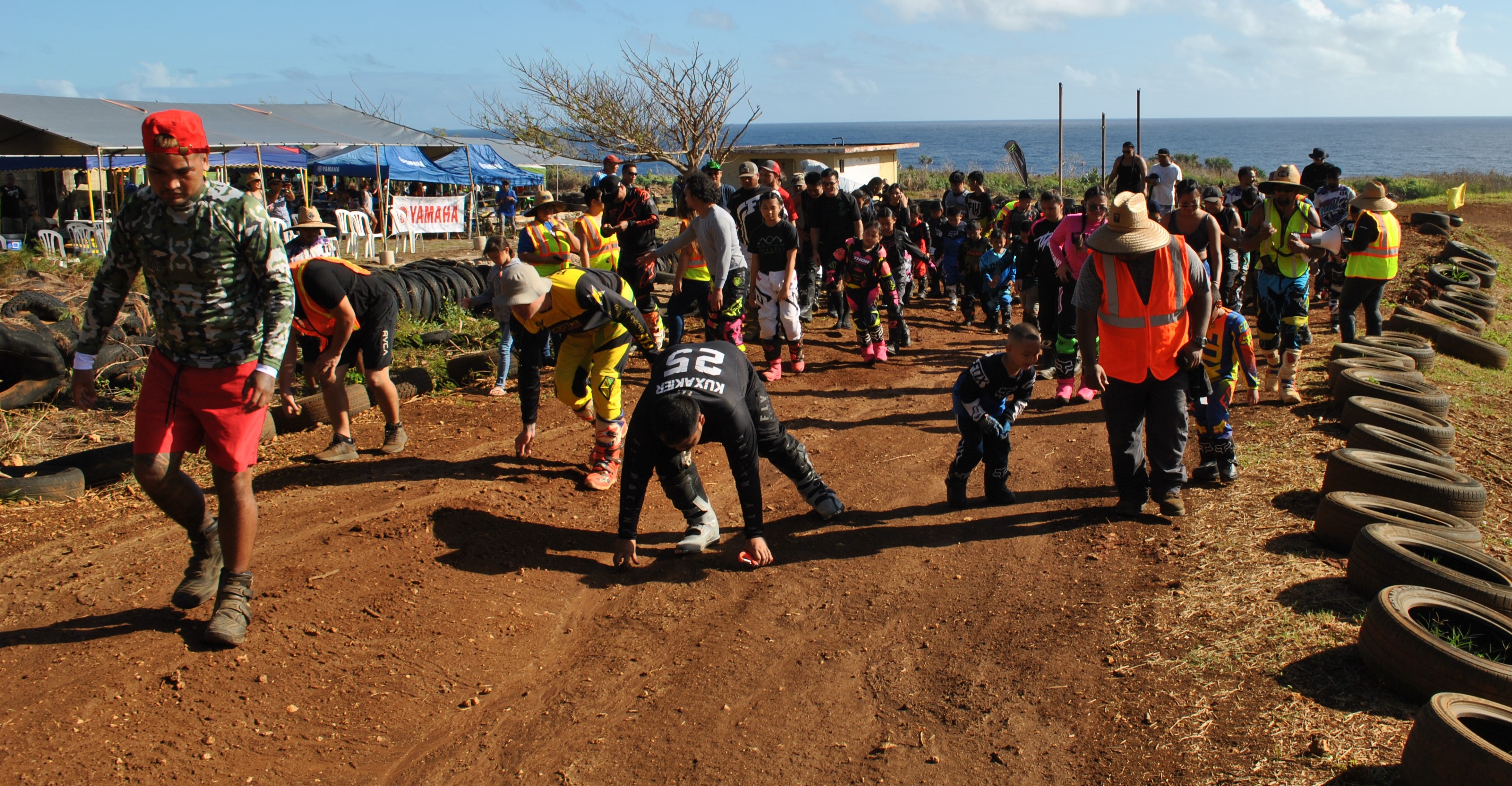Marianas Race Association riders clear the track before the start of the official points race season at the Cow Town track on Sunday. Photo by James F. Sablan Jr.
