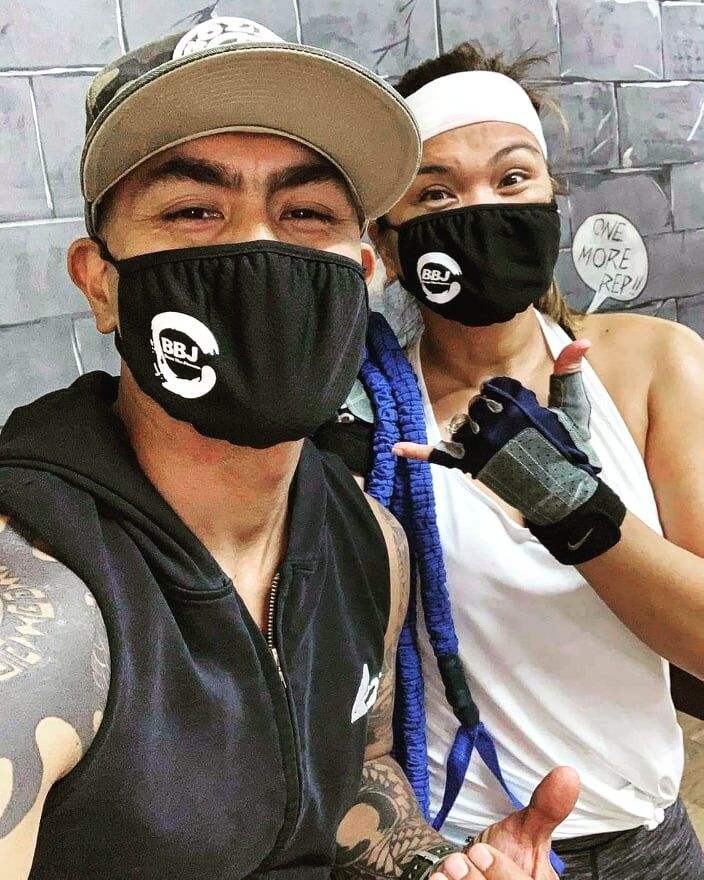 Jerry Diaz, left, poses with his  client Amy Weiss at Gold's Gym Saipan.Contributed photo