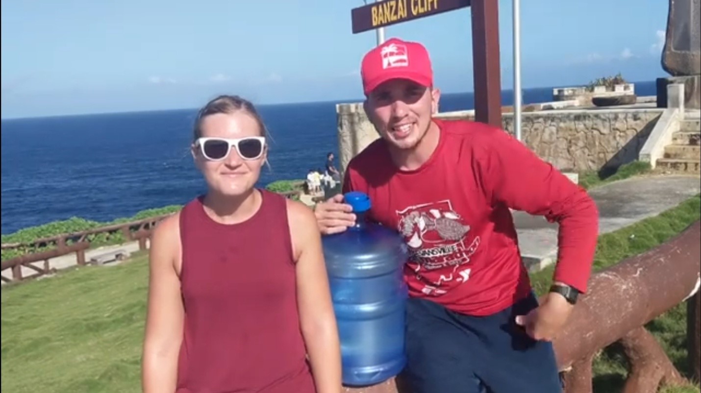 Pastor Mat and Victoria Murphy of Saipan Community Church walked from Pakpak Beach to Banzai Cliff to raise awareness about natural disasters that have struck Honduras and the Philippines.Contributed photo