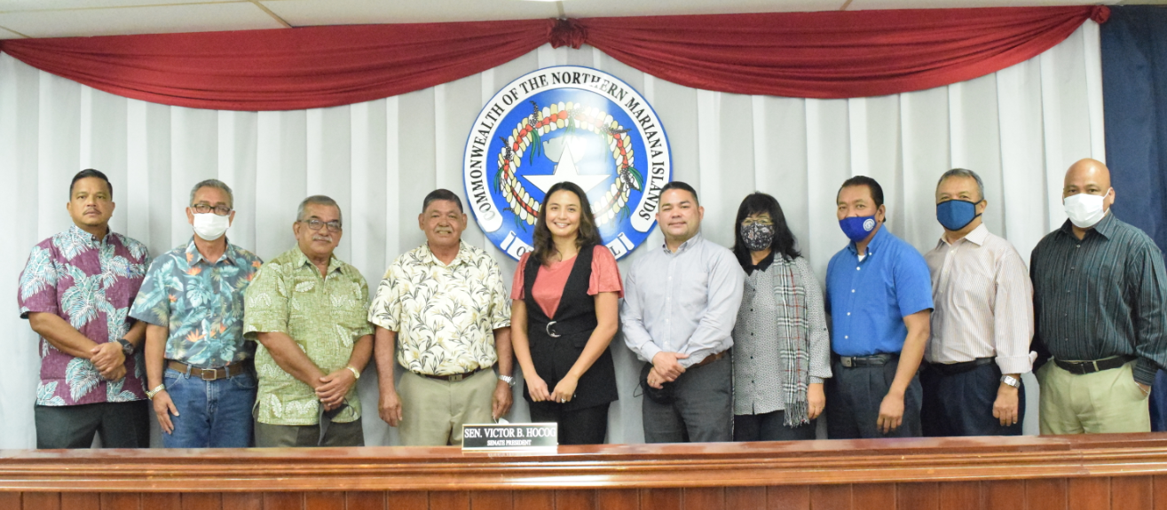 New Northern Marianas Housing Corp. board member Oscar M. Babauta, third left, and the CNMI’s first female public auditor, Kina B. Peter, center, pose with senators shortly after their nominations were confirmed by the Senate on Friday. Photo by Emmanuel T. Erediano