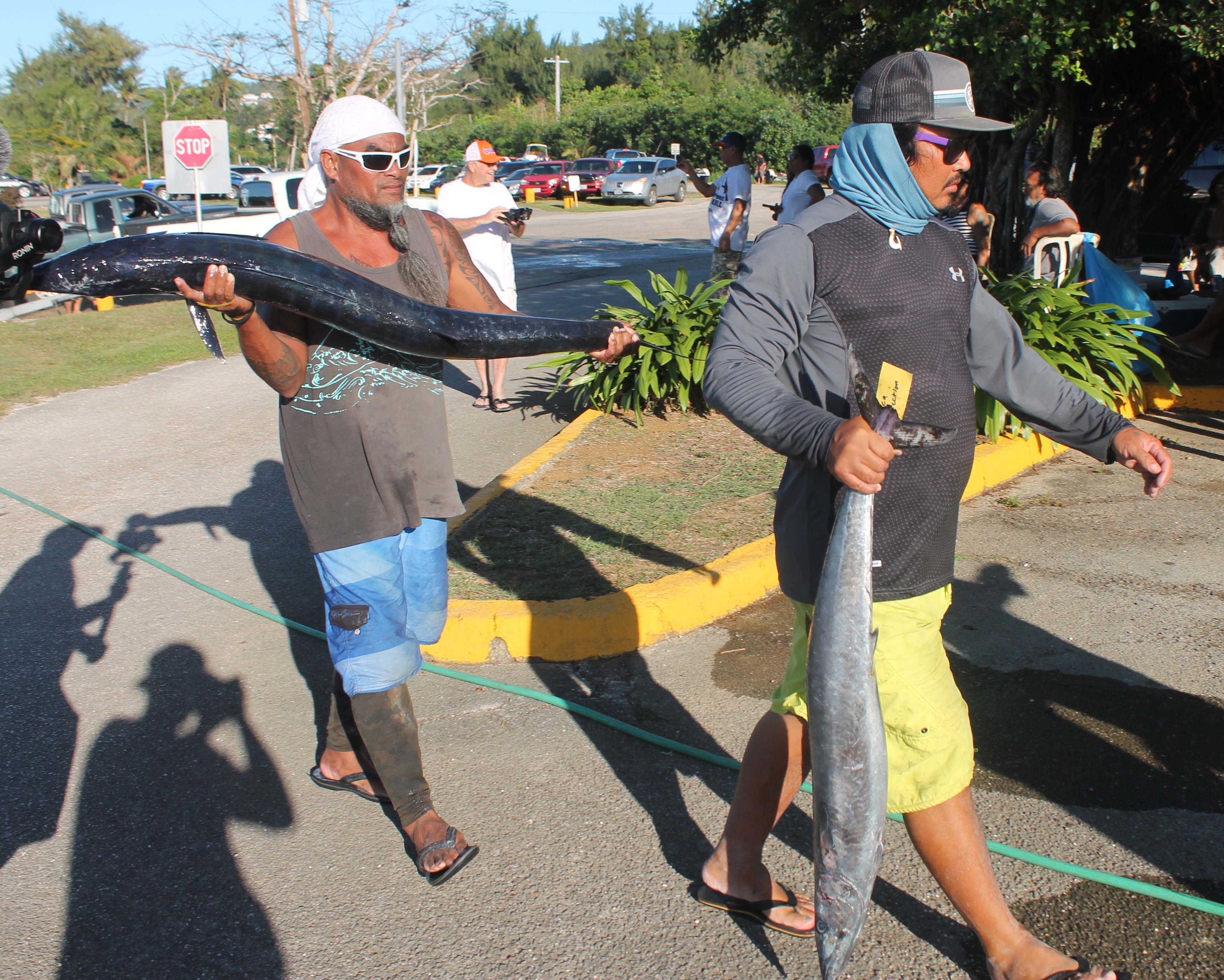 Sea Infection anglers with the Wahoos they caught in the 2019  Wahoo in the Marianas Fishing Tournament at the Smiling Cove Marina.Photo by James F. Sablan Jr.