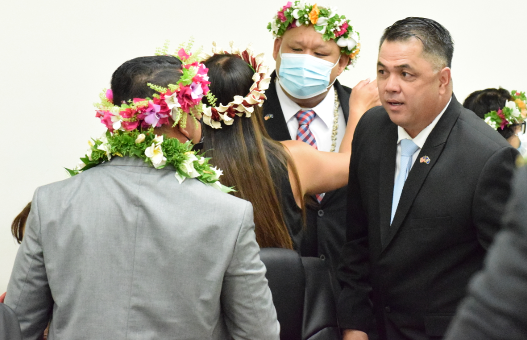 House Floor Leader Ralph N. Yumul, right, listens to Rep. Joel Camacho, left back to the camera, during a break from the organizational session last week. Also in photo is Rep. John Paul Sablan, center, being congratulated by a family member.Photo by Emmanuel T. Erediano