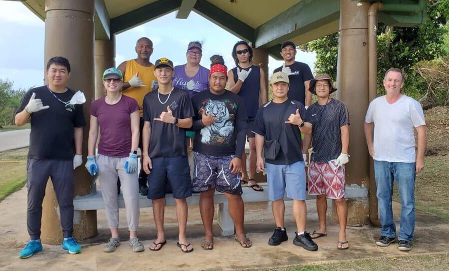 Federal Emergency Management Agency staff members pose for a photo with other volunteers after conducting a cleanup in the Grotto area on Jan. 16, 2021.Contributed photo
