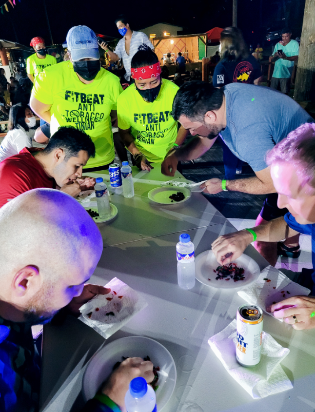 Pika Fest hot pepper eating contest participants had to chew 100 donne-sali hot peppers one at a time.Photo by Bryan Manabat
