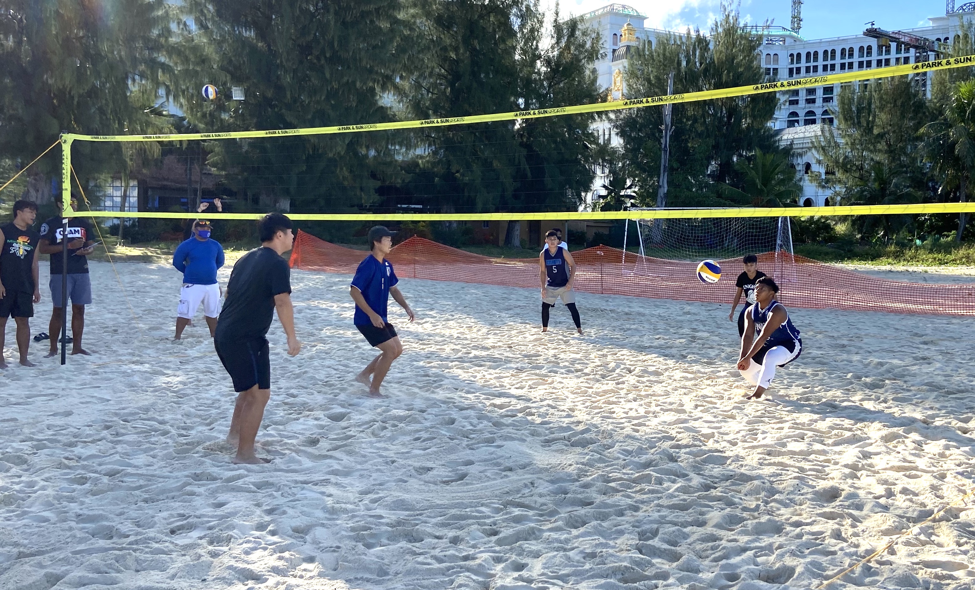 MCS senior Vince Salvador provides strong defense during a Public School Interscholastic 4x4 Beach Volleyball League game on Saturday, Feb. 13, at Fiesta Resort. Mount Carmel School's Team 2 gave a good fight with a 5-4 win-loss record.