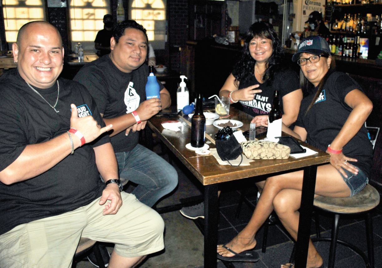 Chris and Cristy Eger with Ben Ngeskebei and Wendi Prater watched Super Bowl LV at Safehouse on Monday morning.Photo by James F. Sablan Jr.