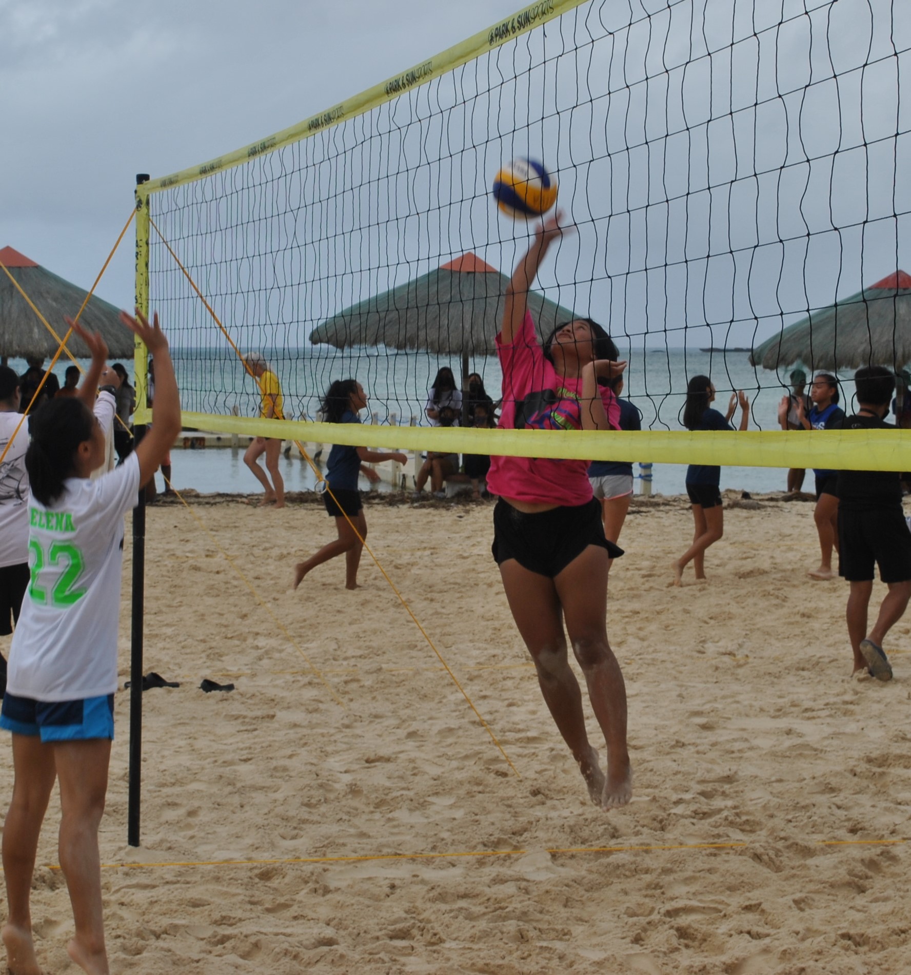 MHS 1's Rasiang extends for the spike finish during a PSS Girls 4v4 Beach Volleyball League game at the Fiesta Resort & Spa beach on Saturday.Photo by James F. Sablan Jr.