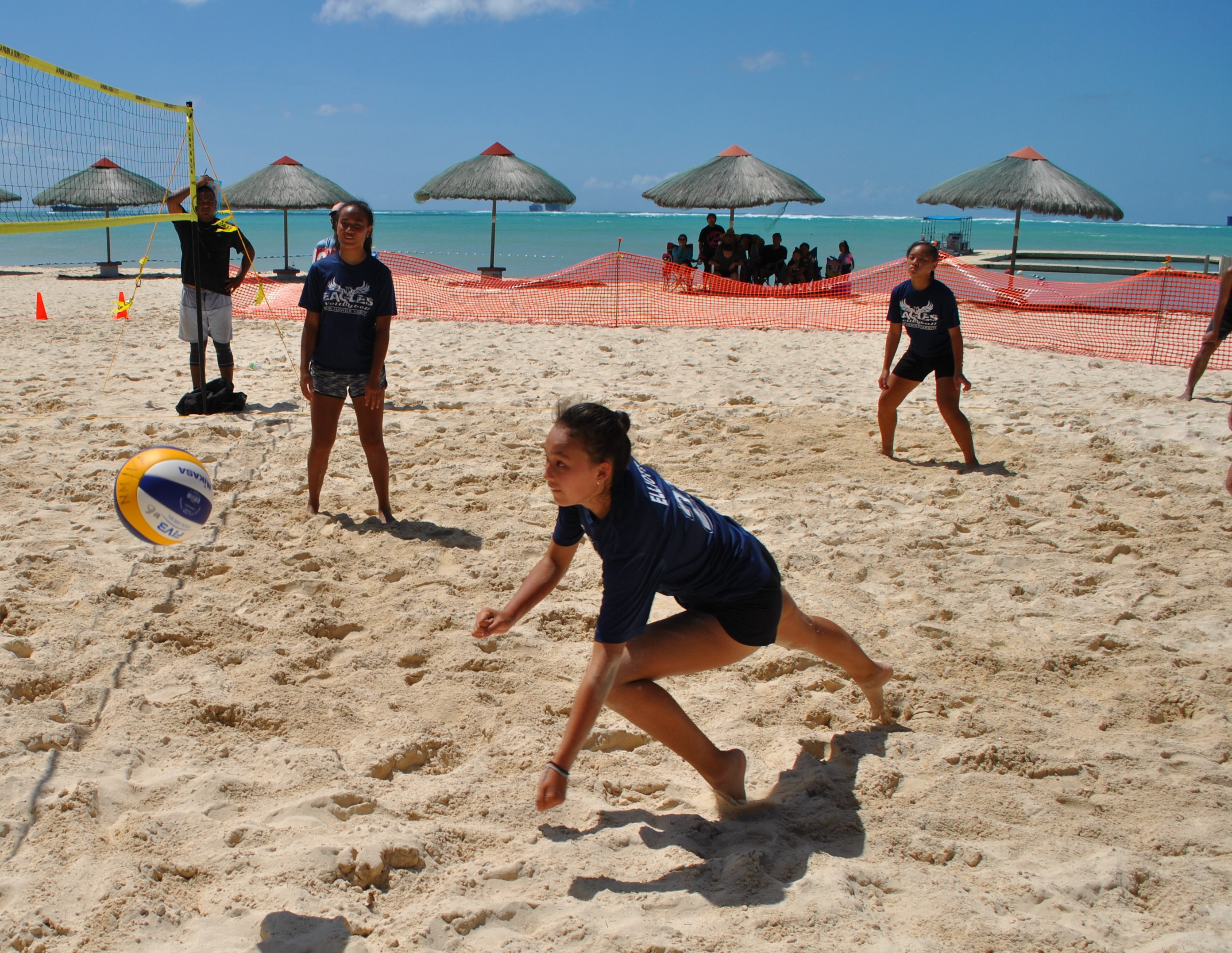 Grace Christian Academy 2's Hye Jin Elliot dives for the save during the championship game of the PSS Girls 4v4 Beach Volleyball League Saturday at the Fiesta Resort & Spa beach.Photo by James F. Sablan Jr.