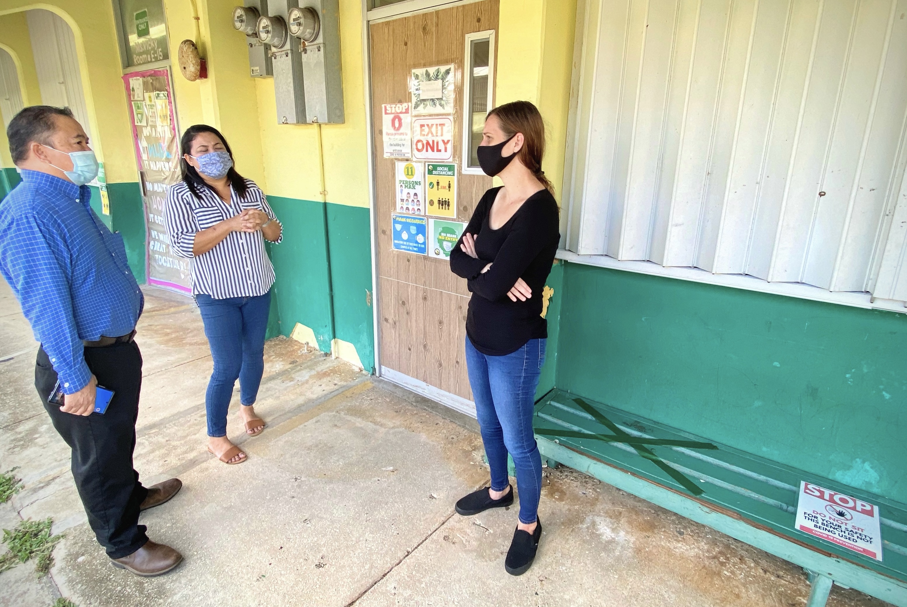 Commissioner of Education Dr. Alfred B. Ada talks with San Vicente Elementary School principal Paulette T. Sablan and vice principal Ana Guerrero as SVES  prepares to welcome students back to campus on Tuesday.Contributed photo