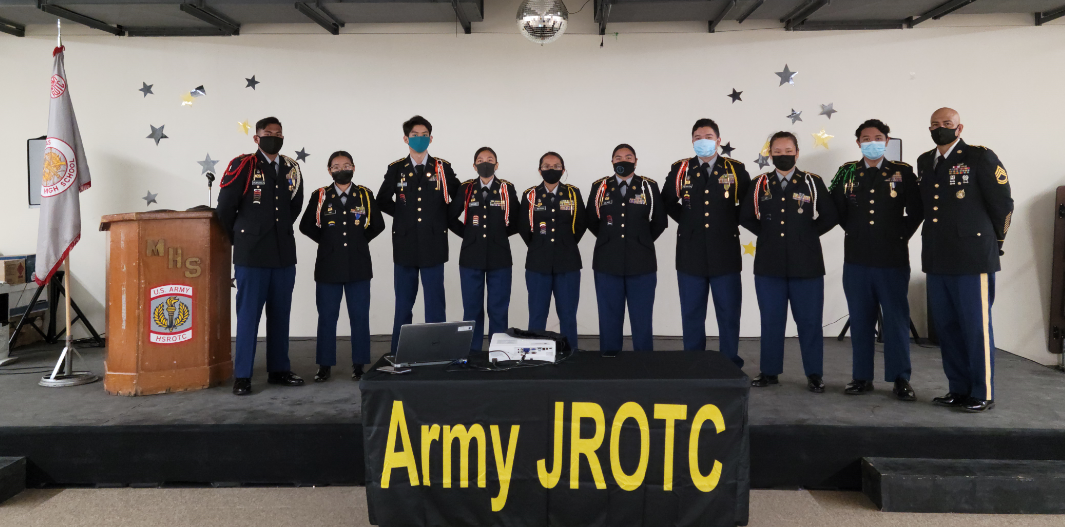The  MHS SY2020-21 Dolphin Battalion staff pose for a photo with their army instructor, SFC Albert Lujan, on Monday in the MHS cafeteria.Photo by K-Andrea Evarose S. Limol