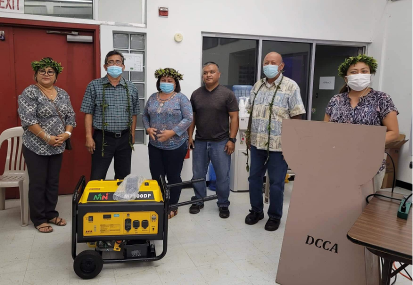 Three providers whose child care business were impacted by Typhoons Mangkhut and Yutu received generators, funded through the Office of Child Care Disaster Funds.  In photo, left to right, are Rota Governor’s Representative Joaquina L. King, Mayor of Rota Efraim M. Atalig, License-Exempt Family, Friends or Neighbors  Provider Joann M. San Nicolas, Rota DCCA Resident Director Dwayne L. Maratita, DCCA Secretary Joseph P. Deleon Guerrero and CCDF Program Administrator Maribel Loste.DCCA-CCDF photo
