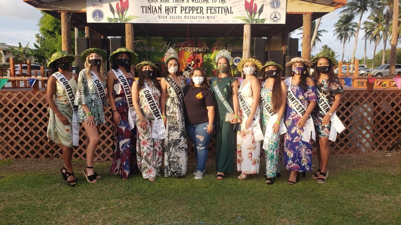 Marianas Visitors Authority Managing Director Priscilla M. Iakopo, center, joins the candidates of the 2021 Miss Marianas pageant for a photo on Feb. 13, 2021 during the 17th Annual Tinian Hot Pepper Festival.MVA photo