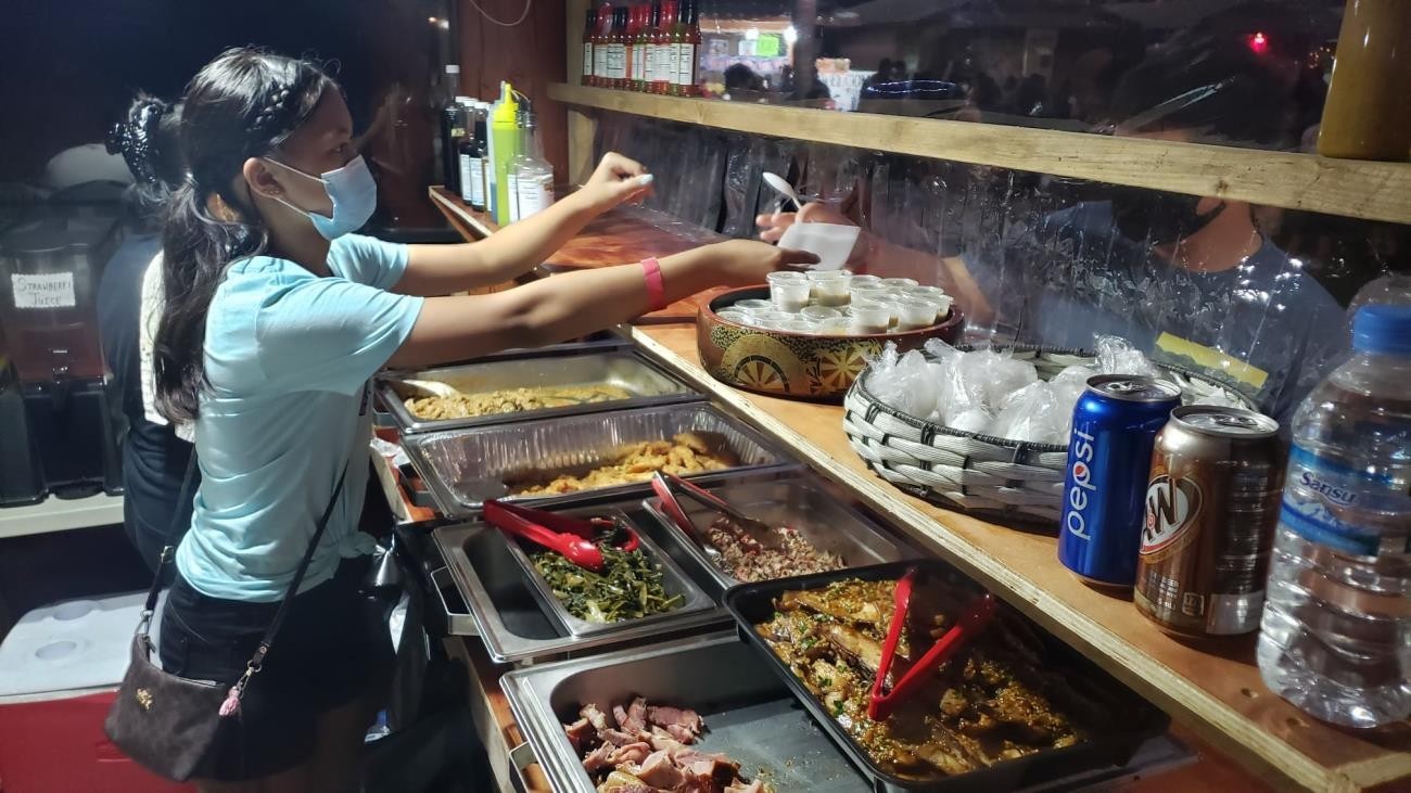 Food vendors serve island favorites on Feb. 13, 2021, at the 17th Annual Tinian Hot Pepper Festival.MVA photo