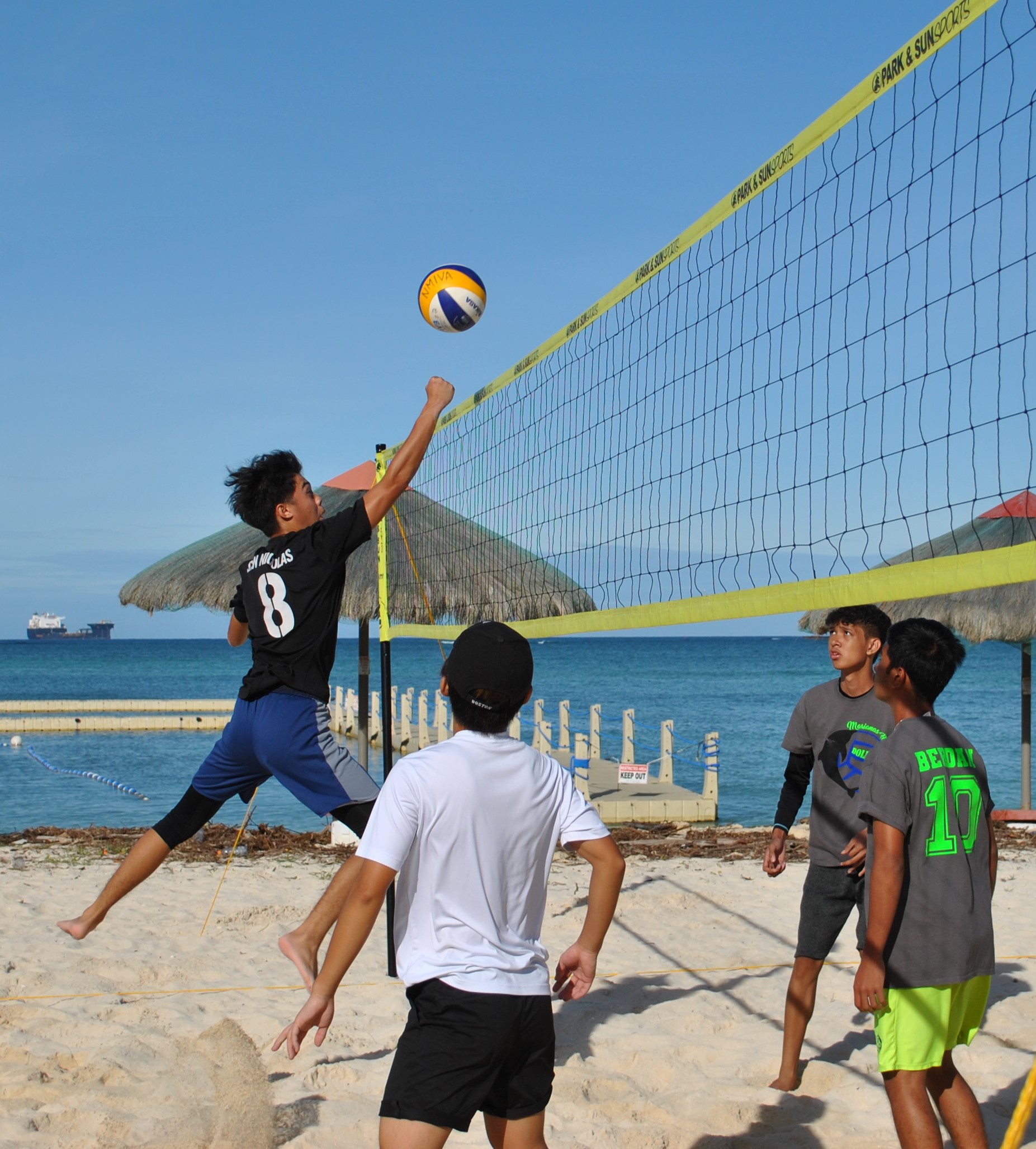 MCS 2's James Patrick San Nicolas reaches out for the tip off.
