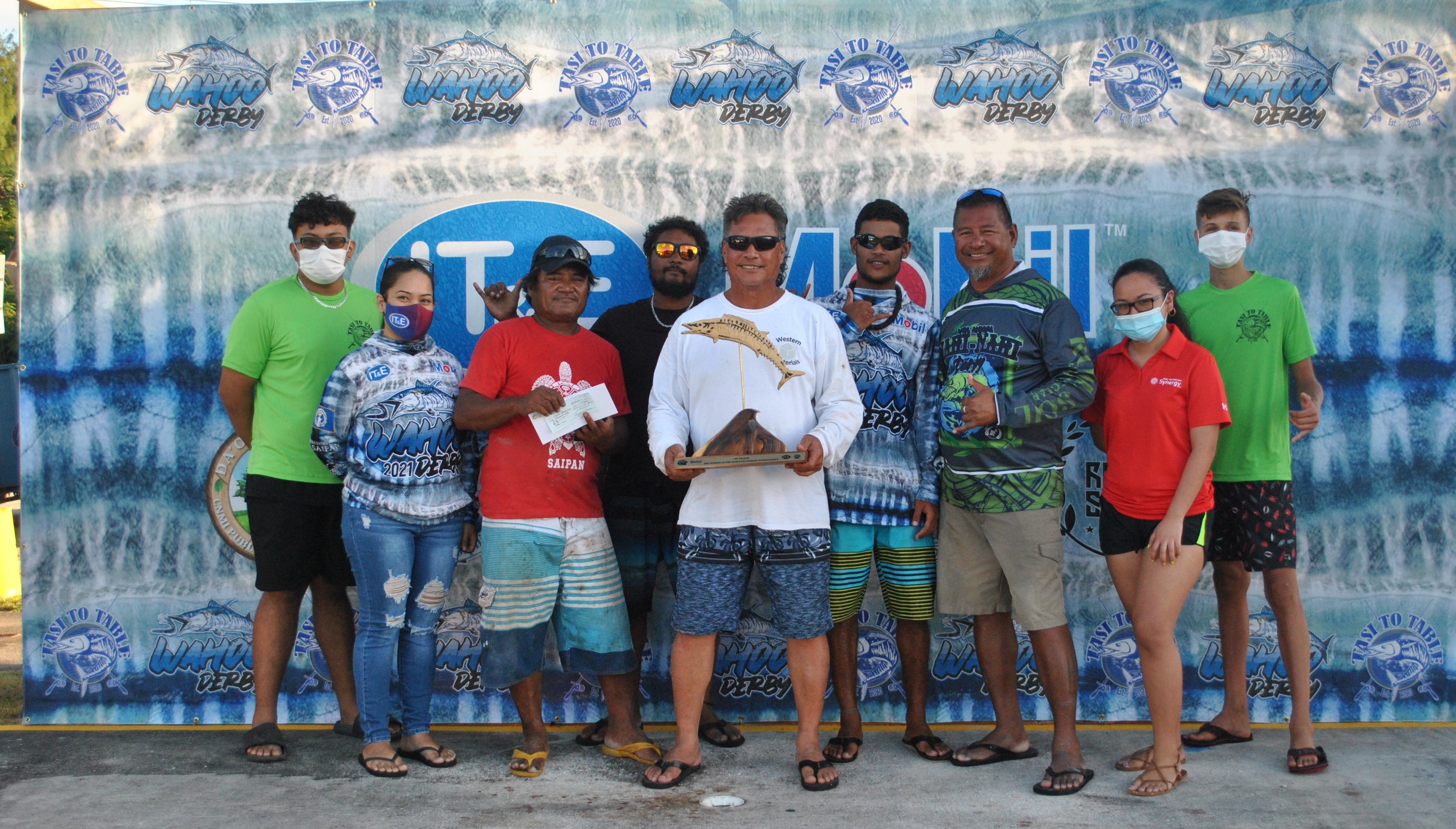 Lucky Harvest crew members pose with the first place trophy.Photo by James F. Sablan Jr.