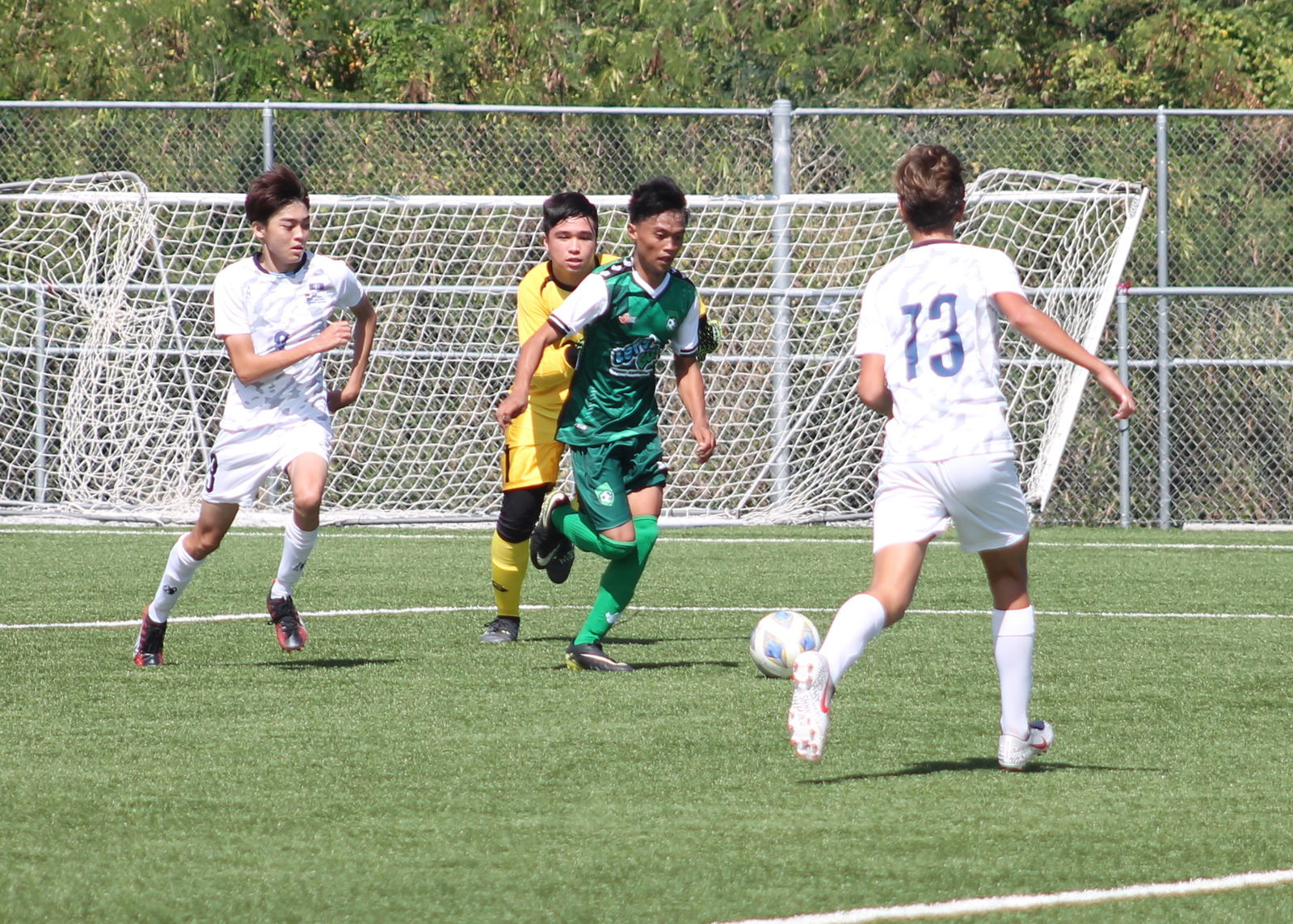 TanHoldings’ Mark Esalan pushes for the finish.