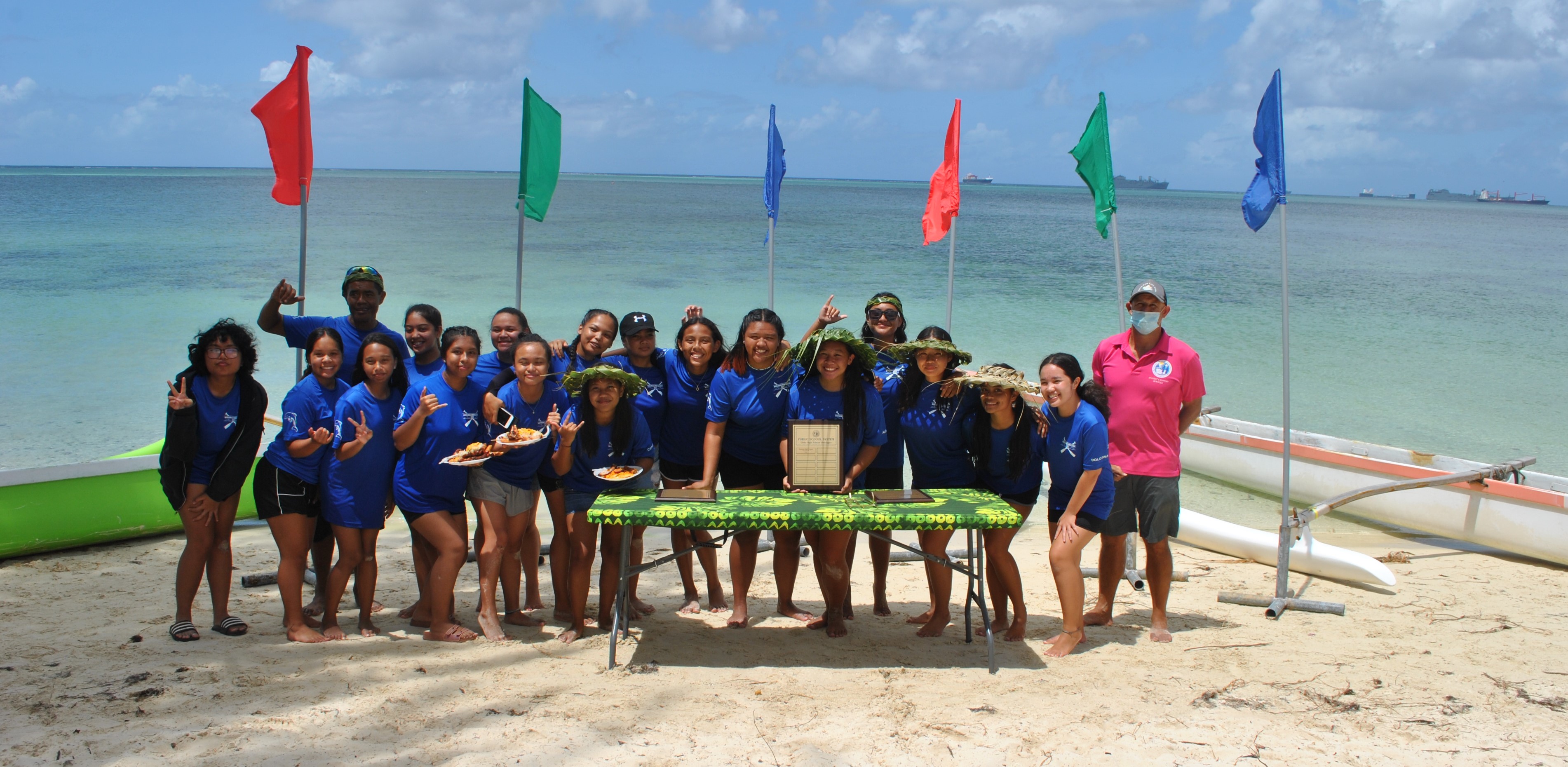 The Marianas High School women's team members pose with the perpetual trophy they won after topping the women’s division of the 2020-2021 PSS Interscholastic Outrigger Points Race Series on Saturday at Kilili Beach.Photo by James F. Sablan Jr