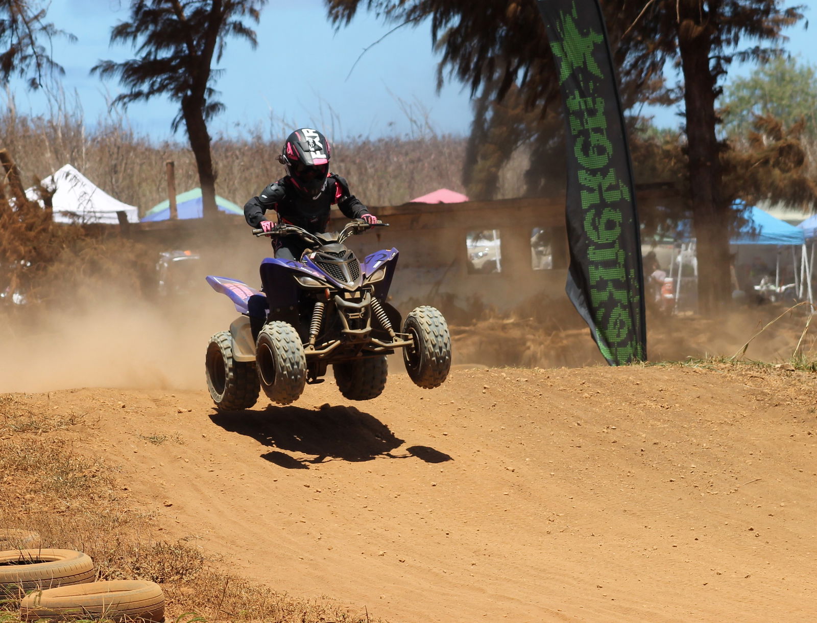 Theresa Borja makes a leap during a Minis ATV class race of the Marianas Racing Association on Sunday at Cow Town Raceway Park.Photo by James F. Sablan Jr.