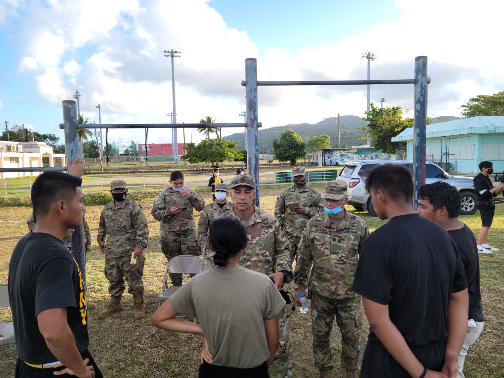 Army Instructor SFC Albert Lujan holds a quick meeting with team leaders following the pull-up challenge.Photo by K-Andrea Evarose S. Limol