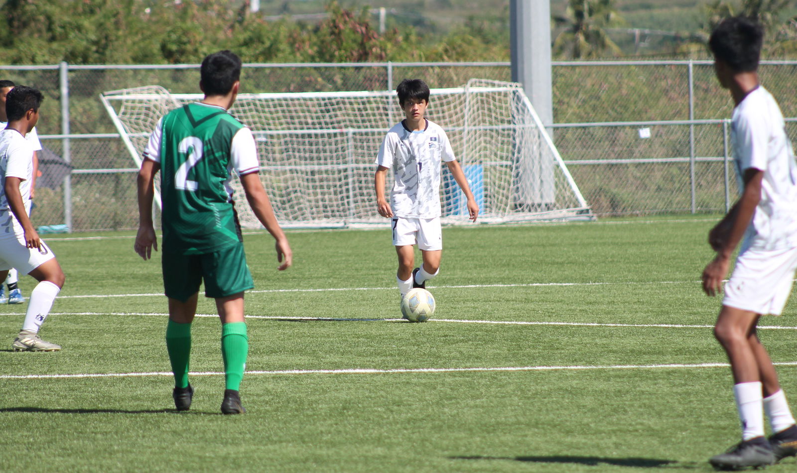U18 NT B's Garrett Weaver looks for an open teammate.