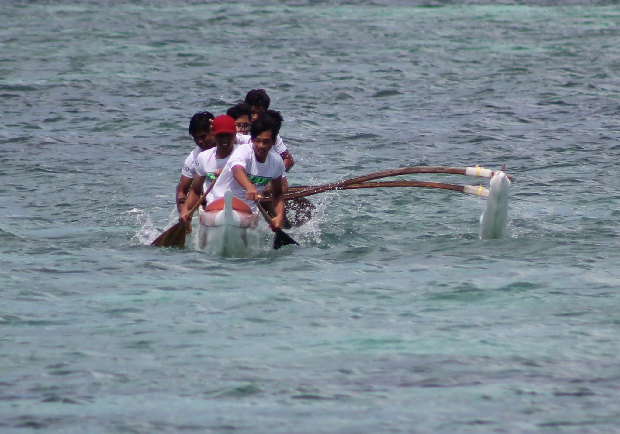 Saipan Southern High School’s paddlers work in sync to push through a turning point in the 3rd leg of the men's 1000m category of the 2020-2021 PSS Interscholastic Outrigger Points Race series at Kilili Beach on Saturday.Photo by James F. Sablan Jr.