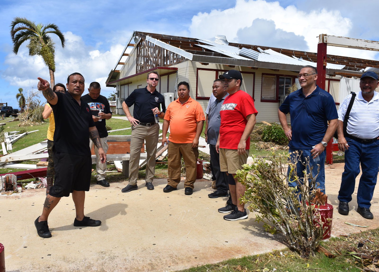 Gov. Ralph DLG Torres, then-FEMA Region IX Deputy Administrator Bill Roche, NMC Board Chairman Charles Cepeda, and NMC Interim President Frankie Eliptico conduct an assessment following Super Typhoon Yutu in Nov. 2018.Office of the Governor photo