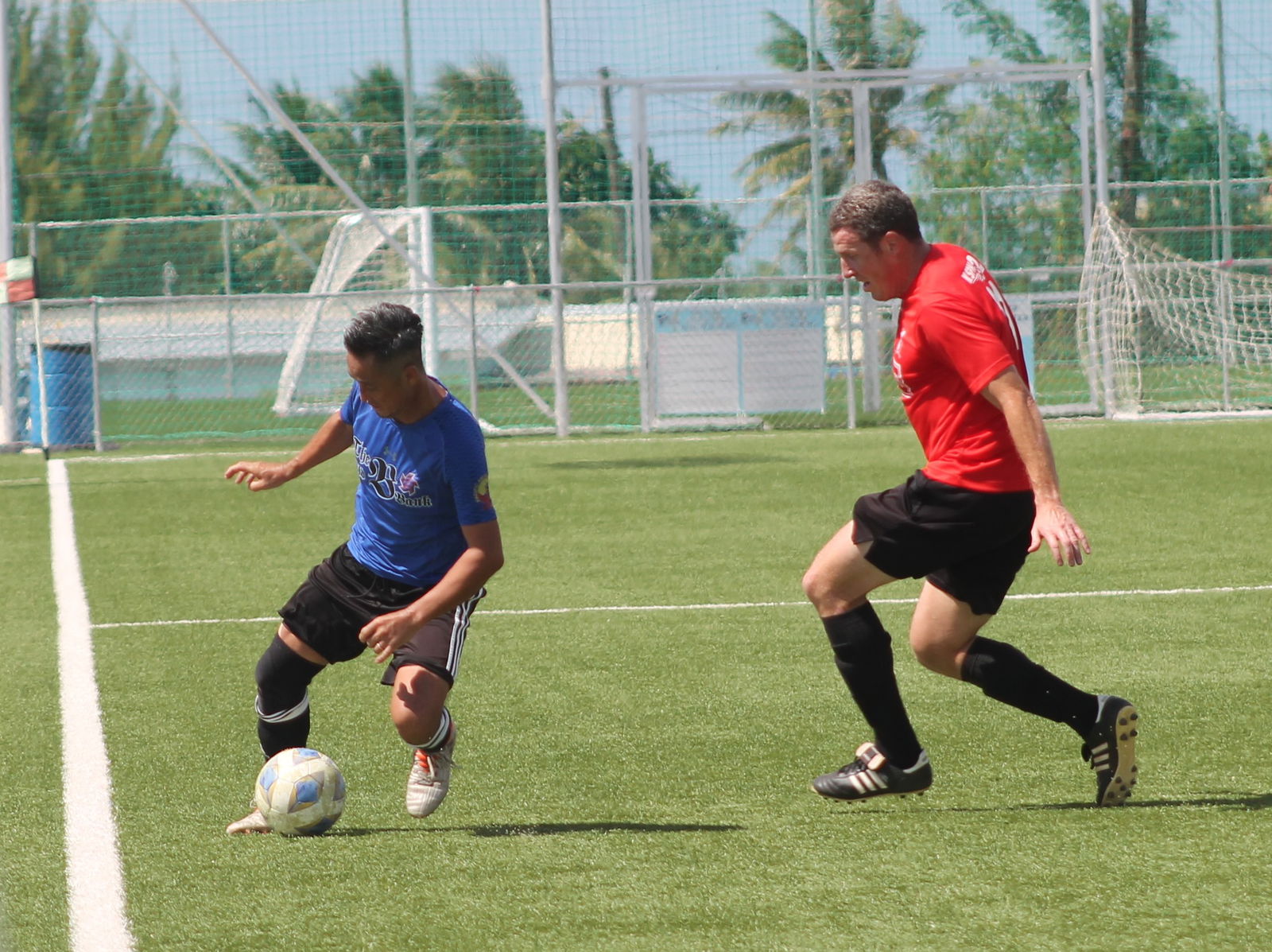 Old B Bank's Albert Bergancia saves the ball from going out of bounds.
