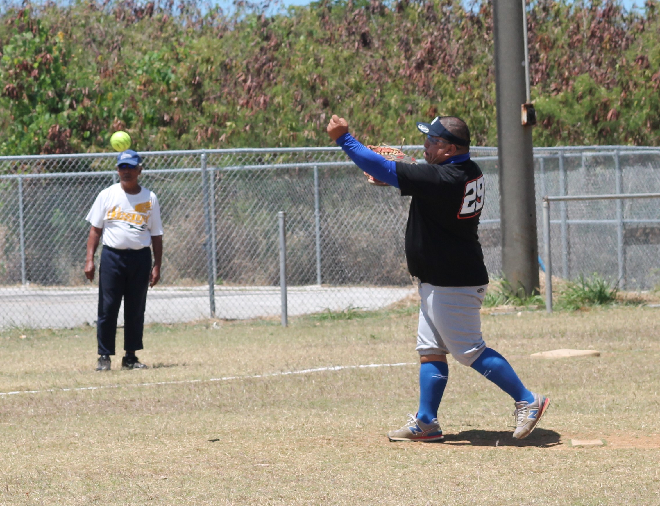 Man Amigos' Derron Flores pitches during a Belau Amateur Softball League game, Sunday, at the Dandan baseball field.Photo by James F. Sablan Jr.