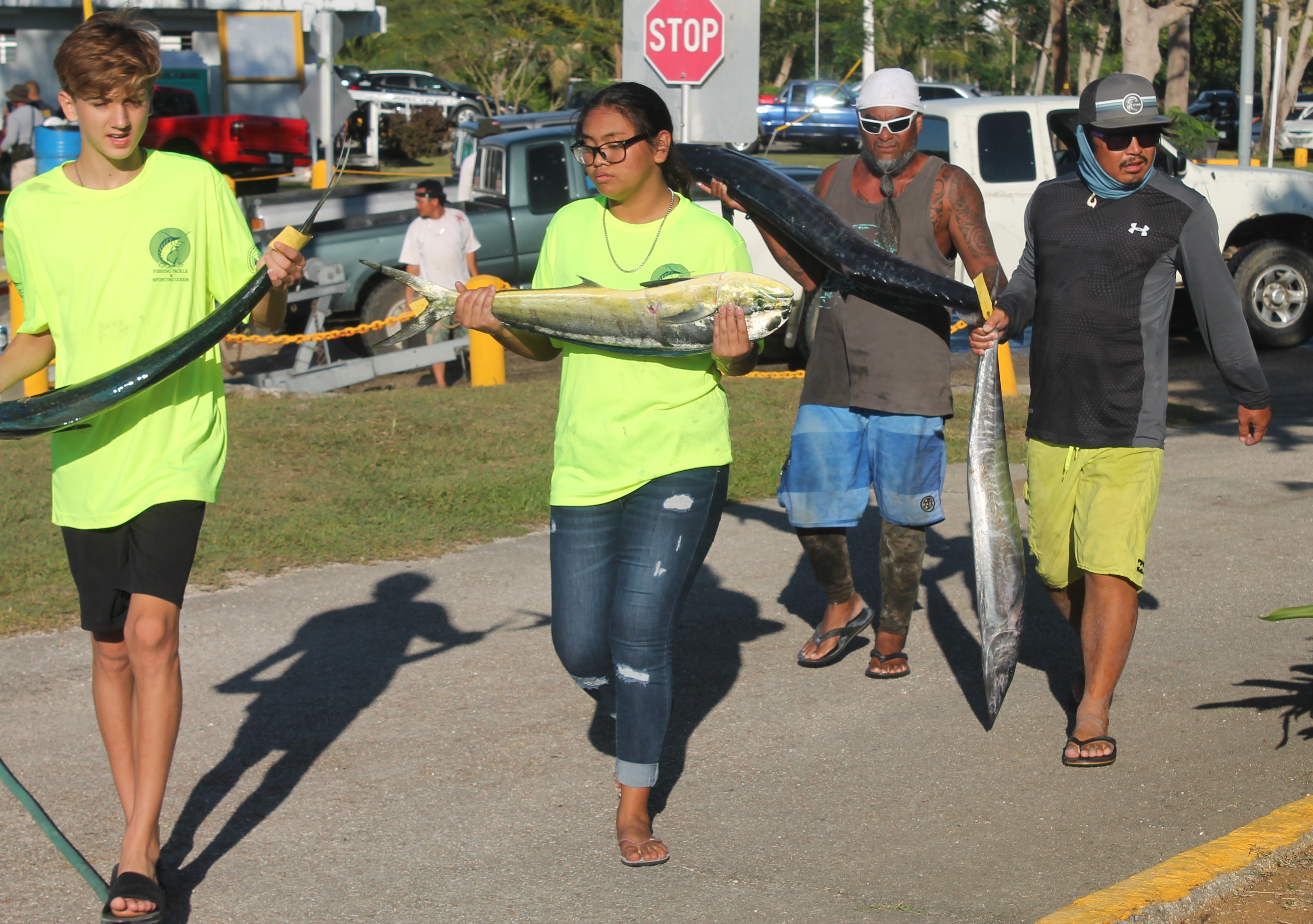 Sea Infection anglers haul the Wahoos they caught during the 1st  Wahoo in the Marianas Fishing Tournament at the Smiling Cove Marina.Photo by James F. Sablan Jr.