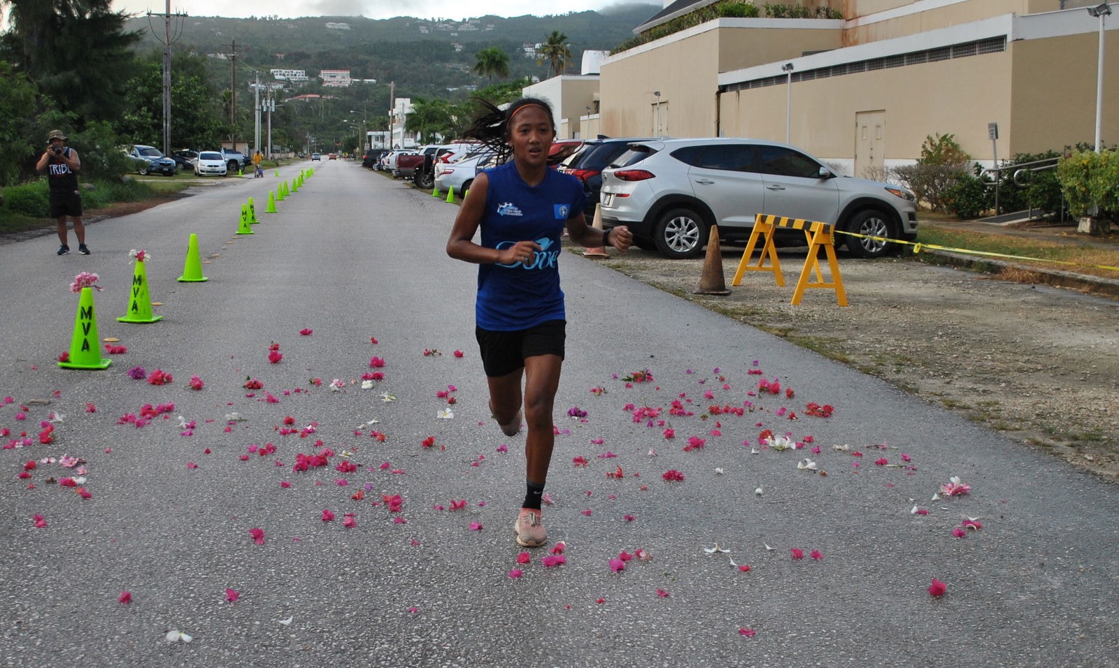 Kaithlyn Chavez crosses the finish line.