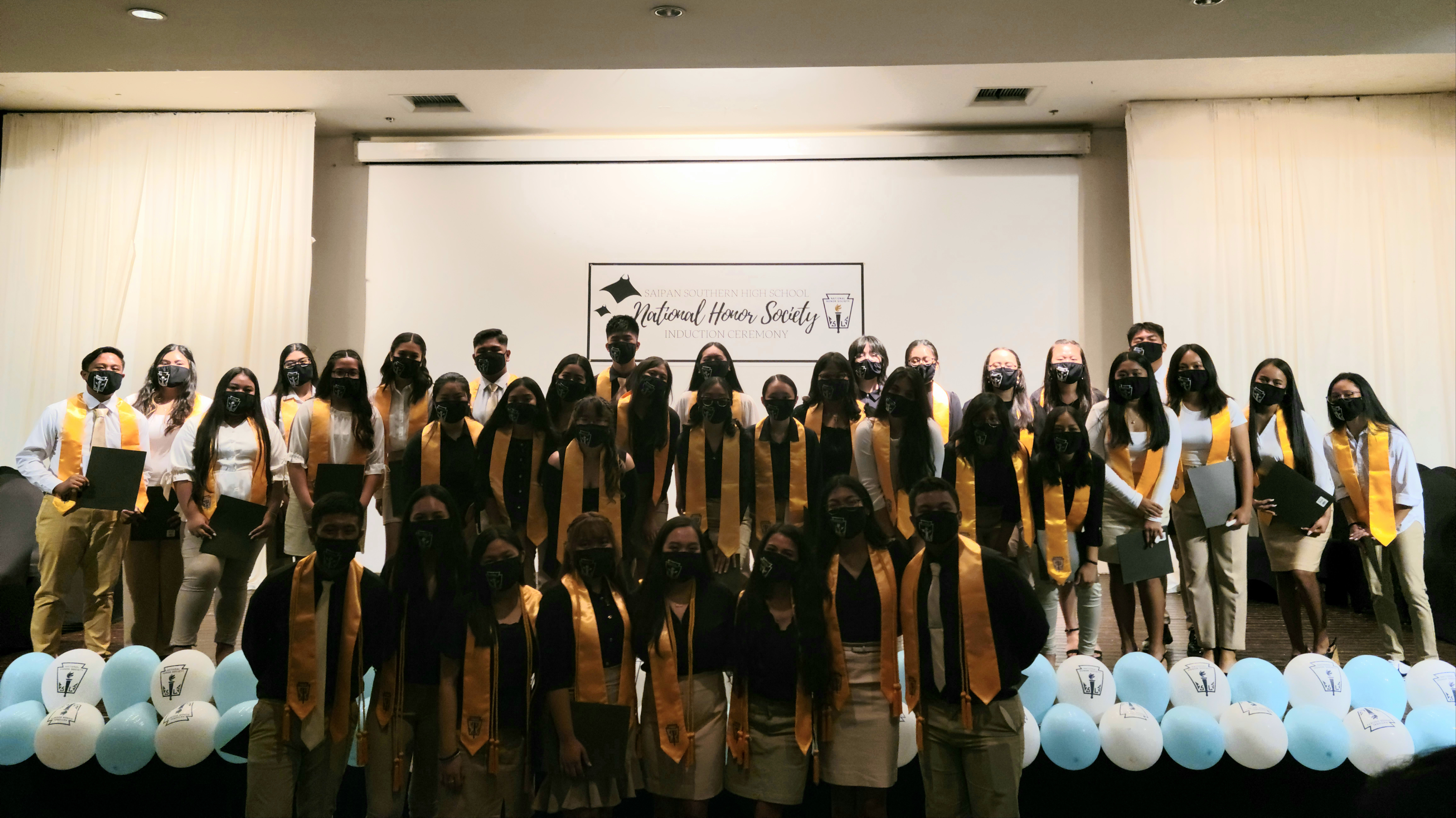 NHS-SSHS Chapter inductees pose for a group photo following their candlelight ceremony.