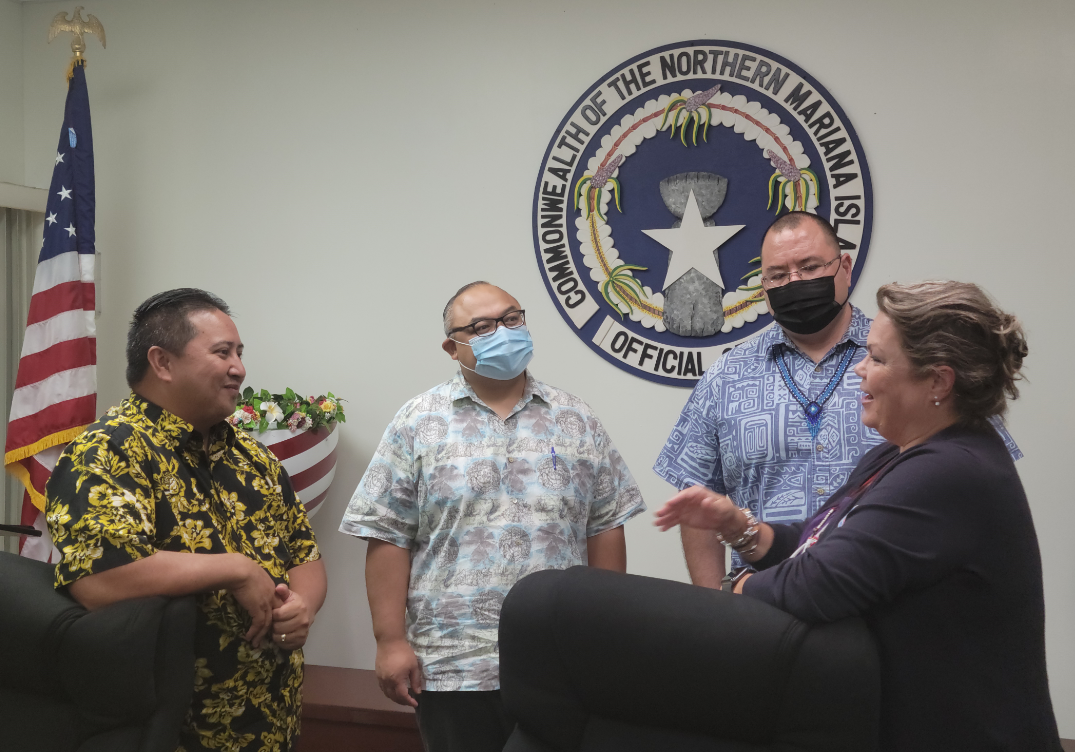 Gov. Ralph DLG Torres, Vice Speaker Blas Jonathan Attao, and Speaker Edmund Villagomez converse with a member of the FEMA team on Monday in the governor's conference room.Photo by K-Andrea Evarose S. Limol