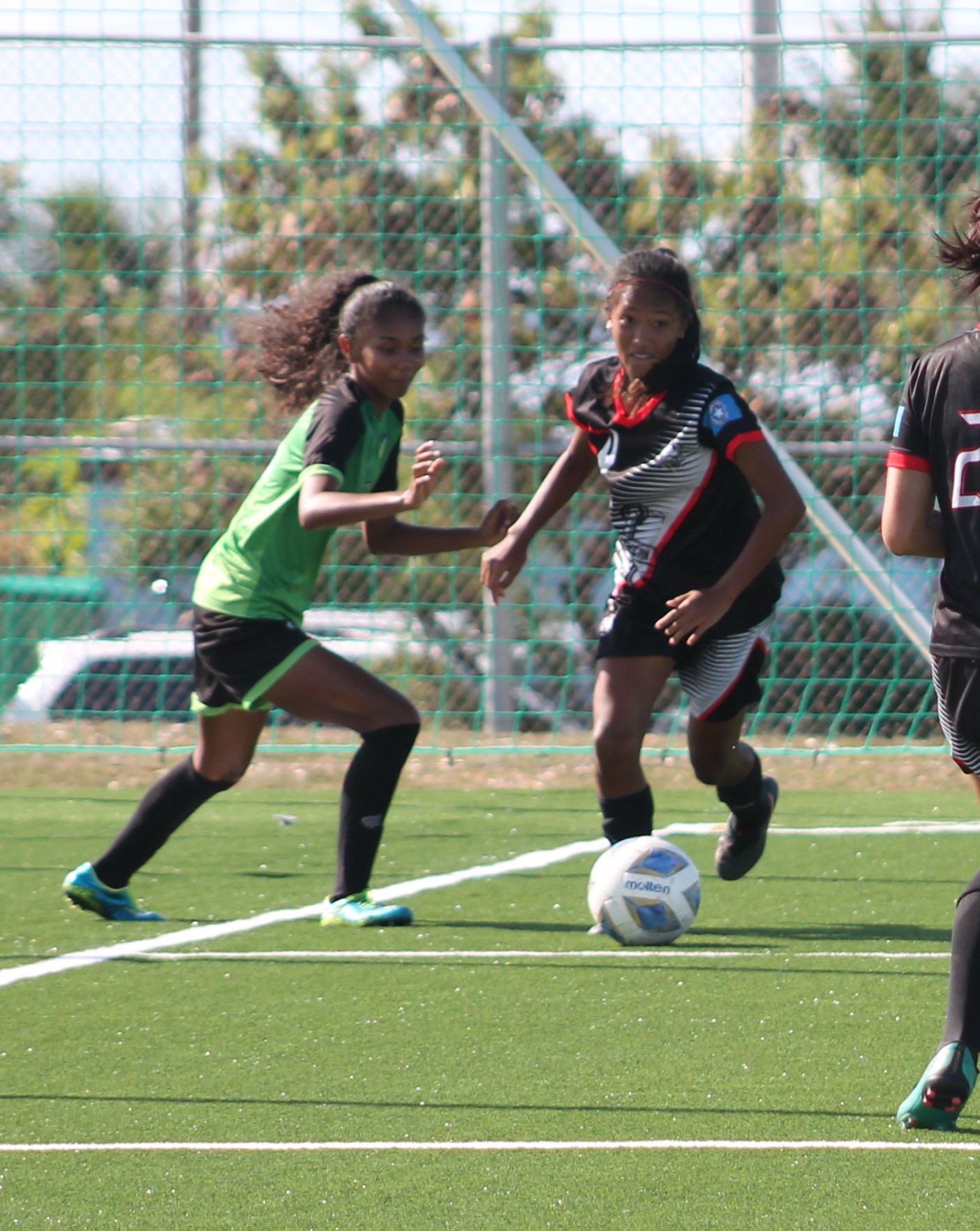 Saipan United Football Club’s Kaithlyn Chavez dribbles past a defender during a Division A game of the Dove Women's League Spring 2021, Sunday, at the NMI Soccer Training Center.Photo by James F. Sablan Jr.