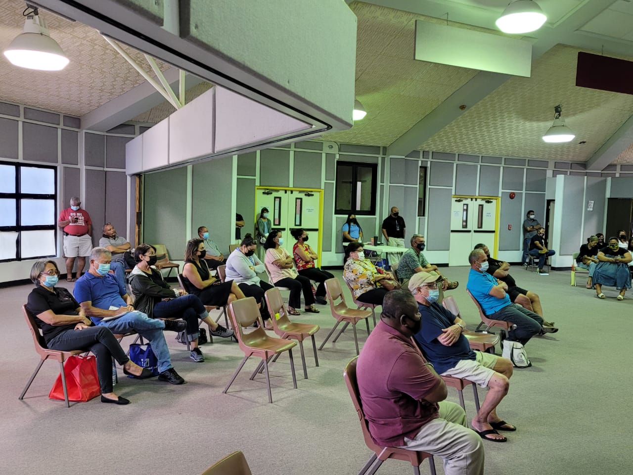 Members of the Guerrero family and other Airport Road residents attend the Coastal Resources Management public hearing at the multi-purpose center on Tuesday.Photo by Emmanuel T. Erediano