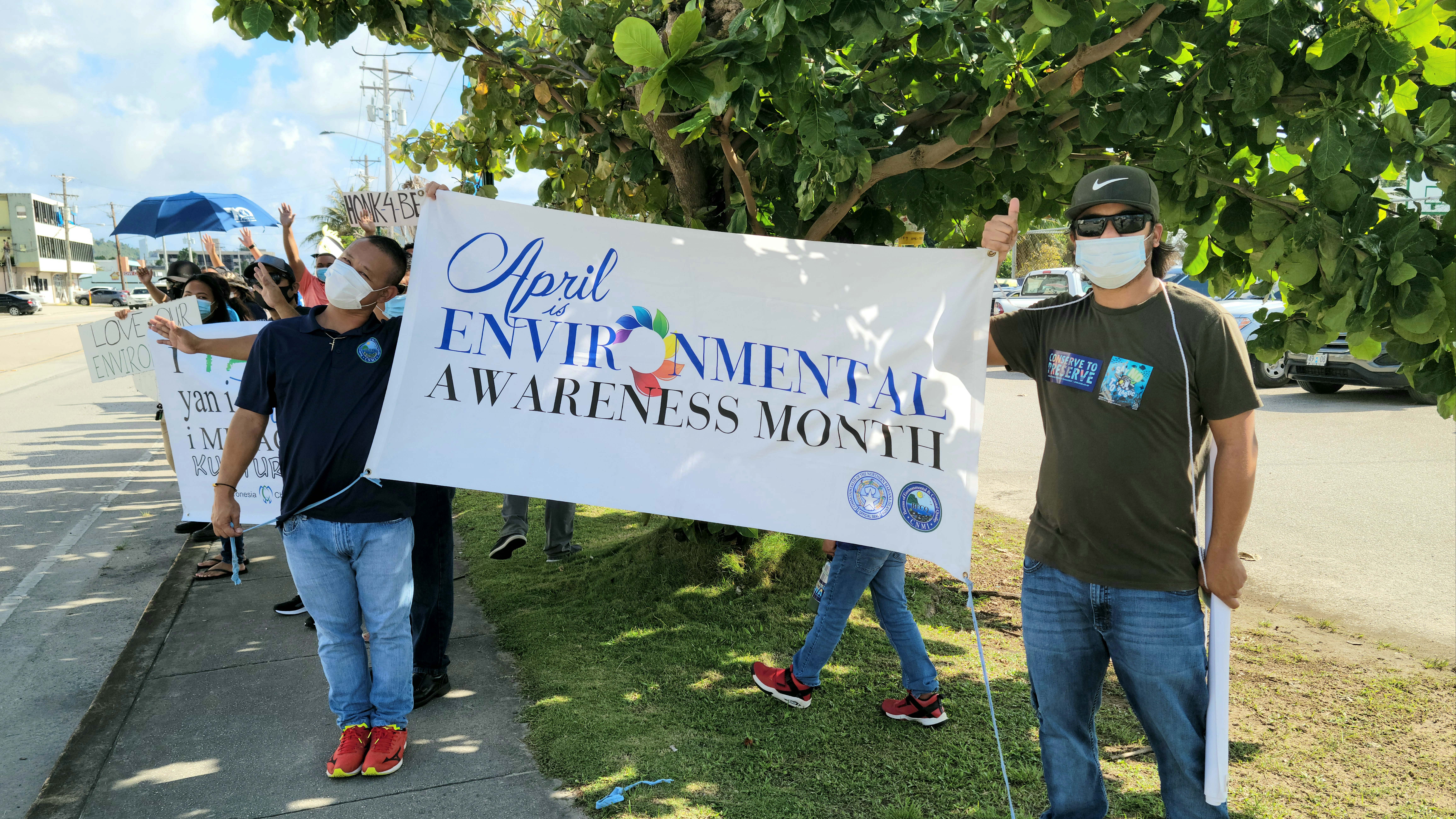 The Bureau of Environmental and Coastal Quality and the Micronesia Islands Nature Alliance combined forces on Friday in Garapan for a roadside waving activity in honor of Environmental Awareness Month.