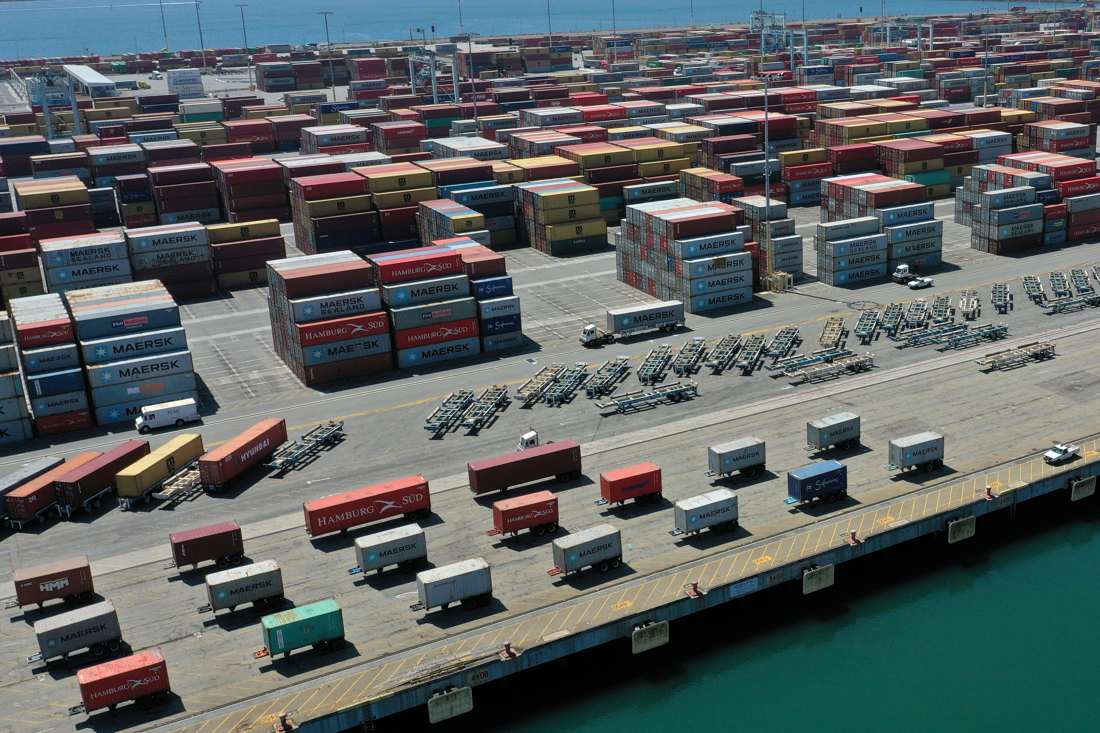 Containers are seen on a shipping dock in the Port of Los Angeles, California on April 16, 2020.REUTERS
