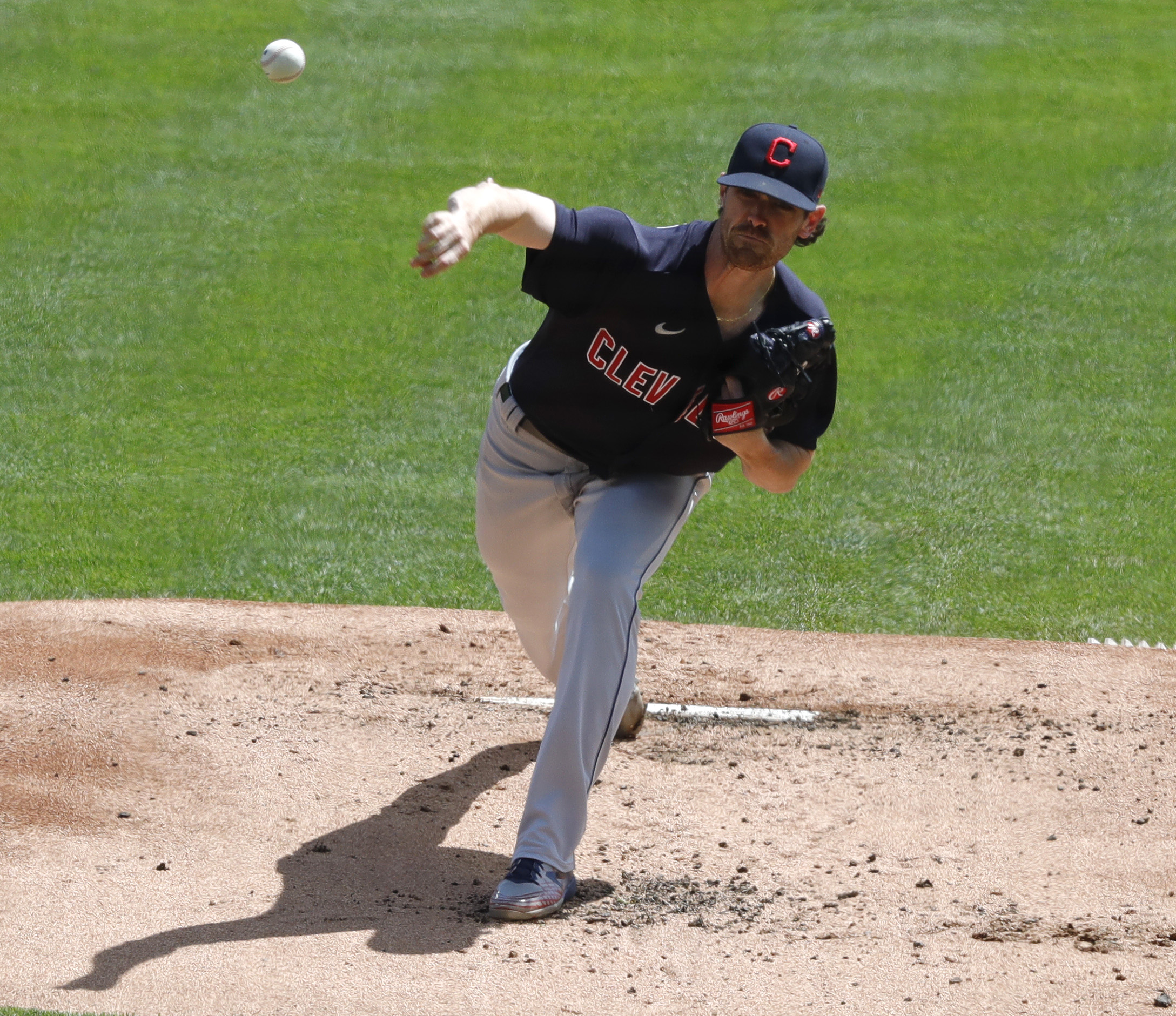 Cleveland Indians starting pitcher Shane Bieber (57) throws against the Cincinnati Reds during the first inning at Great American Ball Park in Cincinnati, Ohio on April 18, 2021.Photo  by David Kohl-USA TODAY Sports