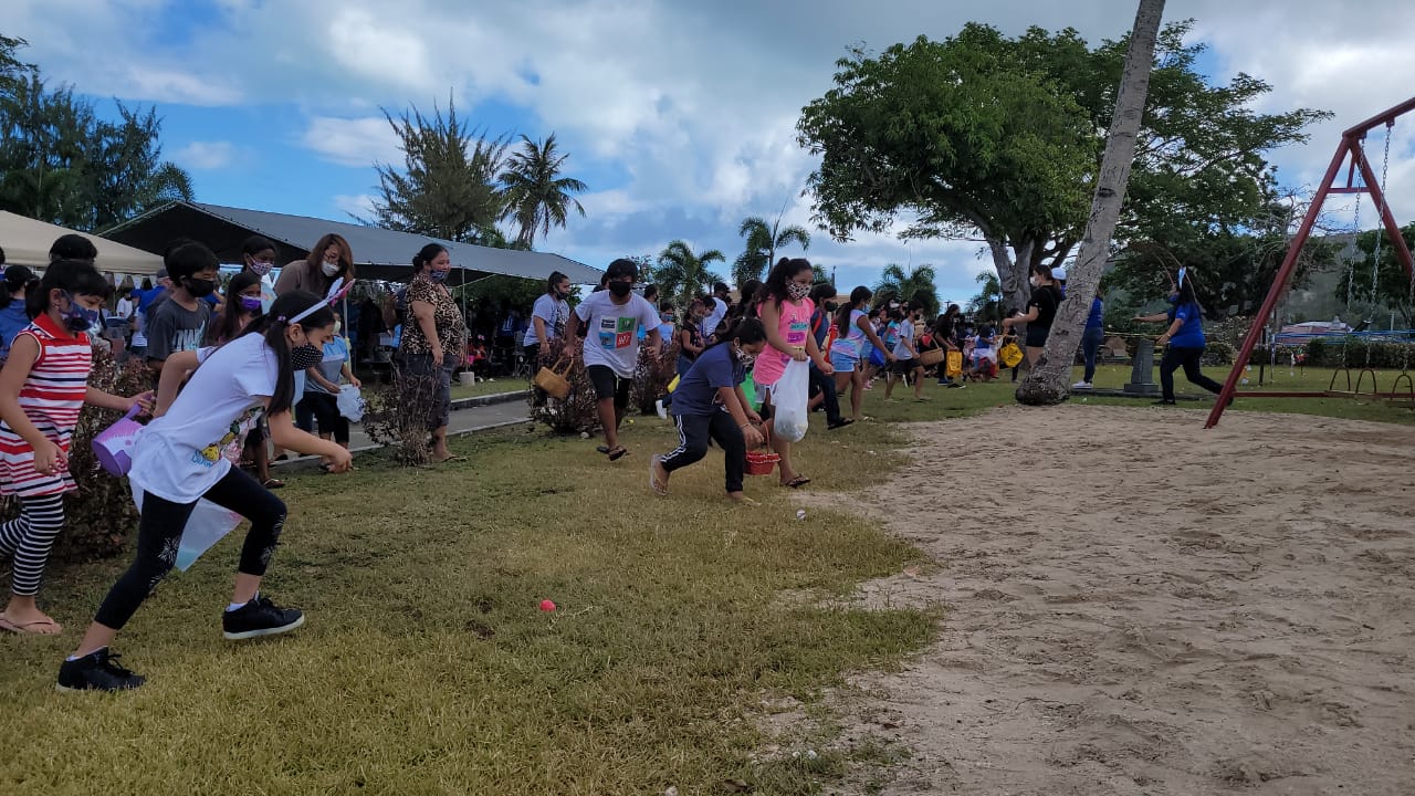 Elementary school children search for the Easter eggs during the Rotary Club’s Easter Egg Hunt at Sugar King Park in Garapan on Saturday.Photo by Emmanuel T. Erediano