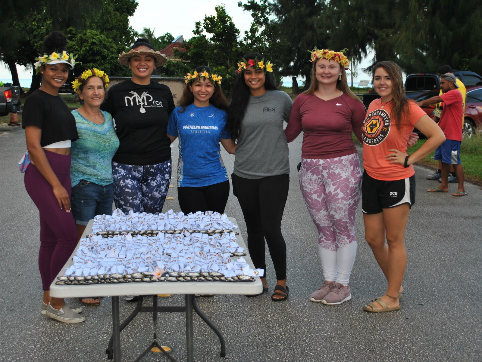 The volunteers of the NMI Women's Run pose for a photo near the finish line: Yvonne Bennet, Marcia Schultz, Rep. Sheila Babauta, Mae Duenas Basa, Lia Rangamar, Maxine Lazlo and Jessica Williams.