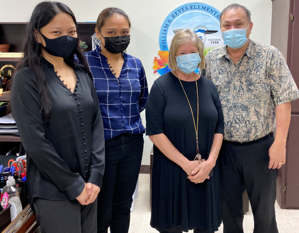 Board of Education Chairman Andrew L.  Orsini with William S. Reyes Elementary School principal Lynn Mendiola, vice principal Jocelyn Manibusan, and BOE teacher representative Phyllis Ain.