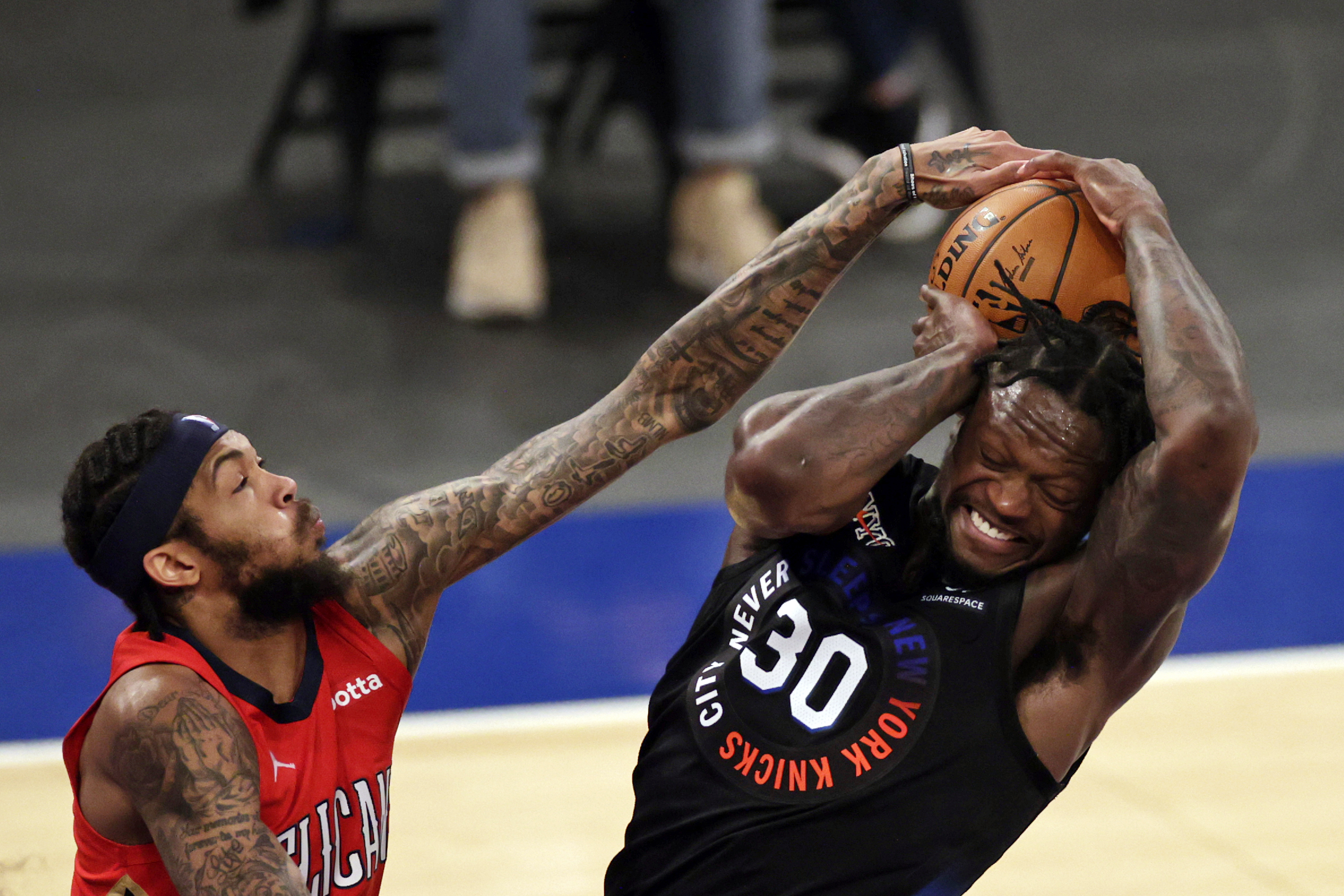 New York Knicks forward Julius Randle (30) battles for the ball with New Orleans Pelicans forward Brandon Ingram during the second half at Madison Square Garden in New York, April 18, 2021.Photo by Adam Hunger/POOL PHOTOS-USA TODAY Sports