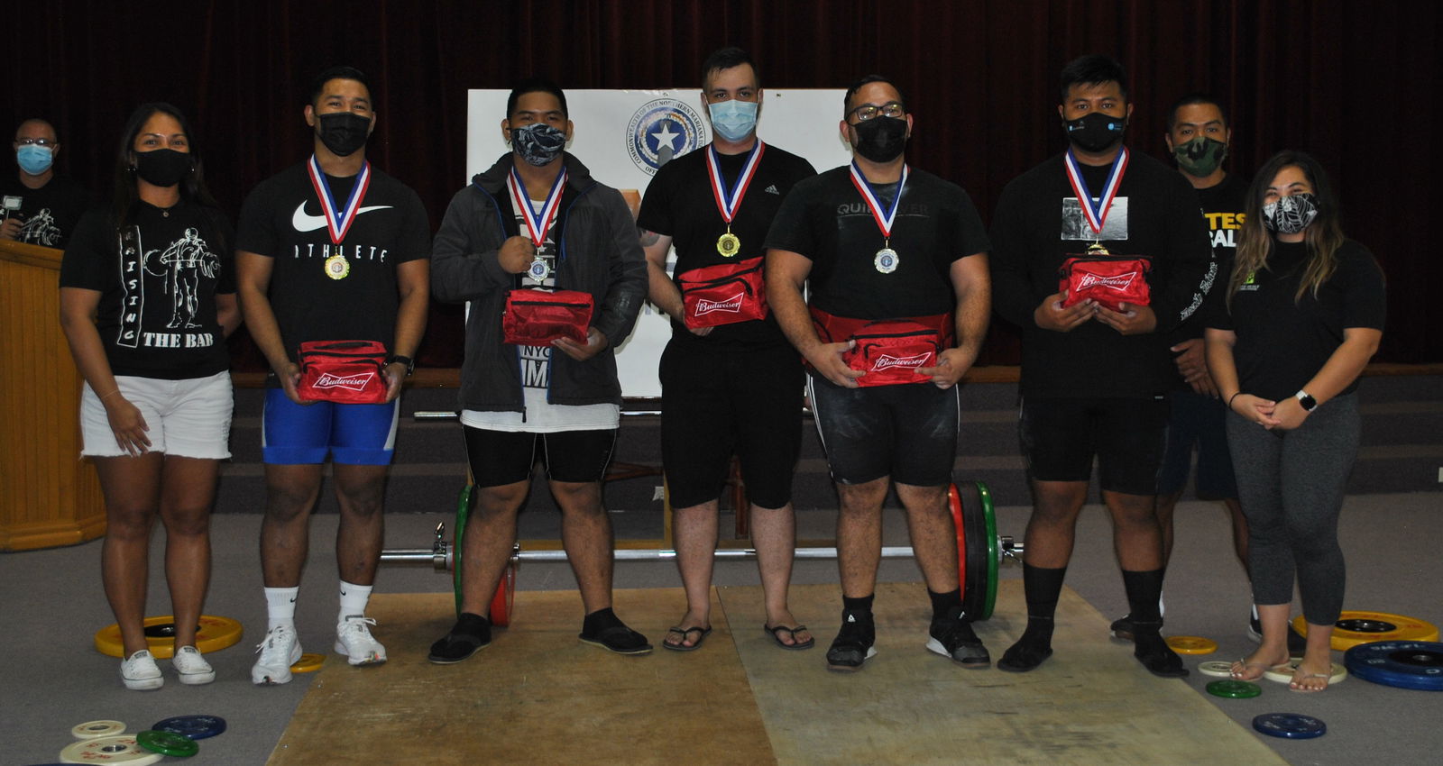 Joey Colisao, 4th left, poses with the rest of the heavyweight category lifters during the awards ceremony of the 2nd Marianas Cup at the multi-purpose center on March 27, 2021.Photo by James F. Sablan Jr.