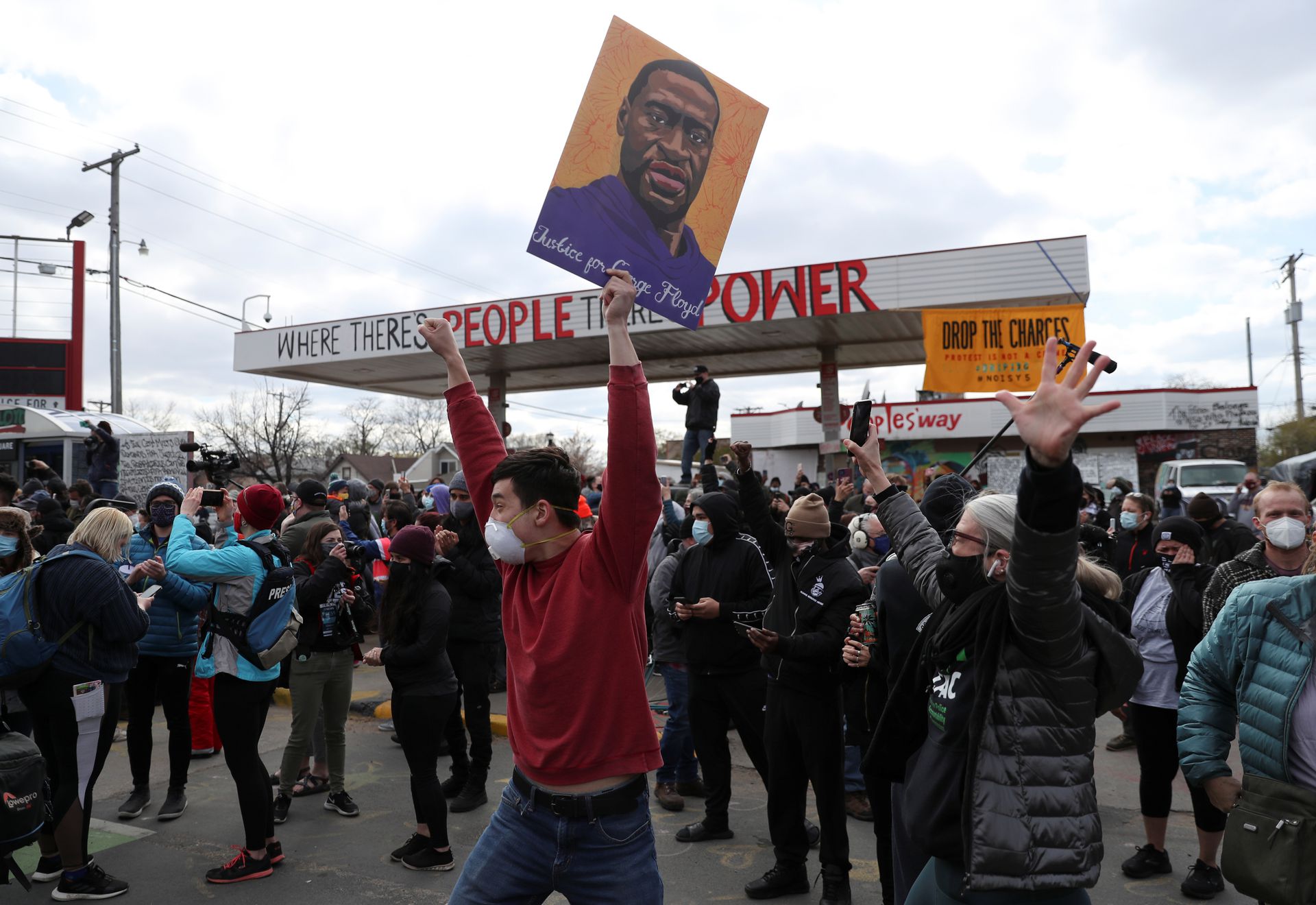People react after the verdict in the trial of former Minneapolis police officer Derek Chauvin, found guilty of the death of George Floyd, at George Floyd Square in Minneapolis, Minnesota, April 20, 2021.REUTERS