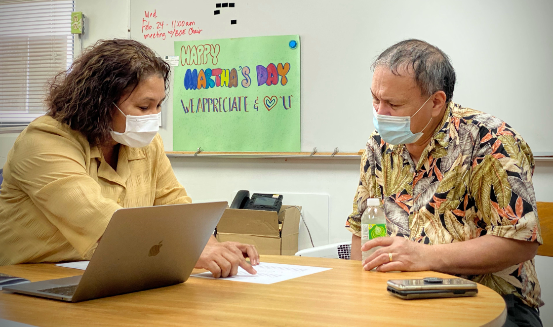 Chacha Oceanview Middle School principal Martha Kintol discusses an issue with Board of Education Chairman Andrew L.  Orsini. Not in photo is vice principal Le’ah Murphy.
