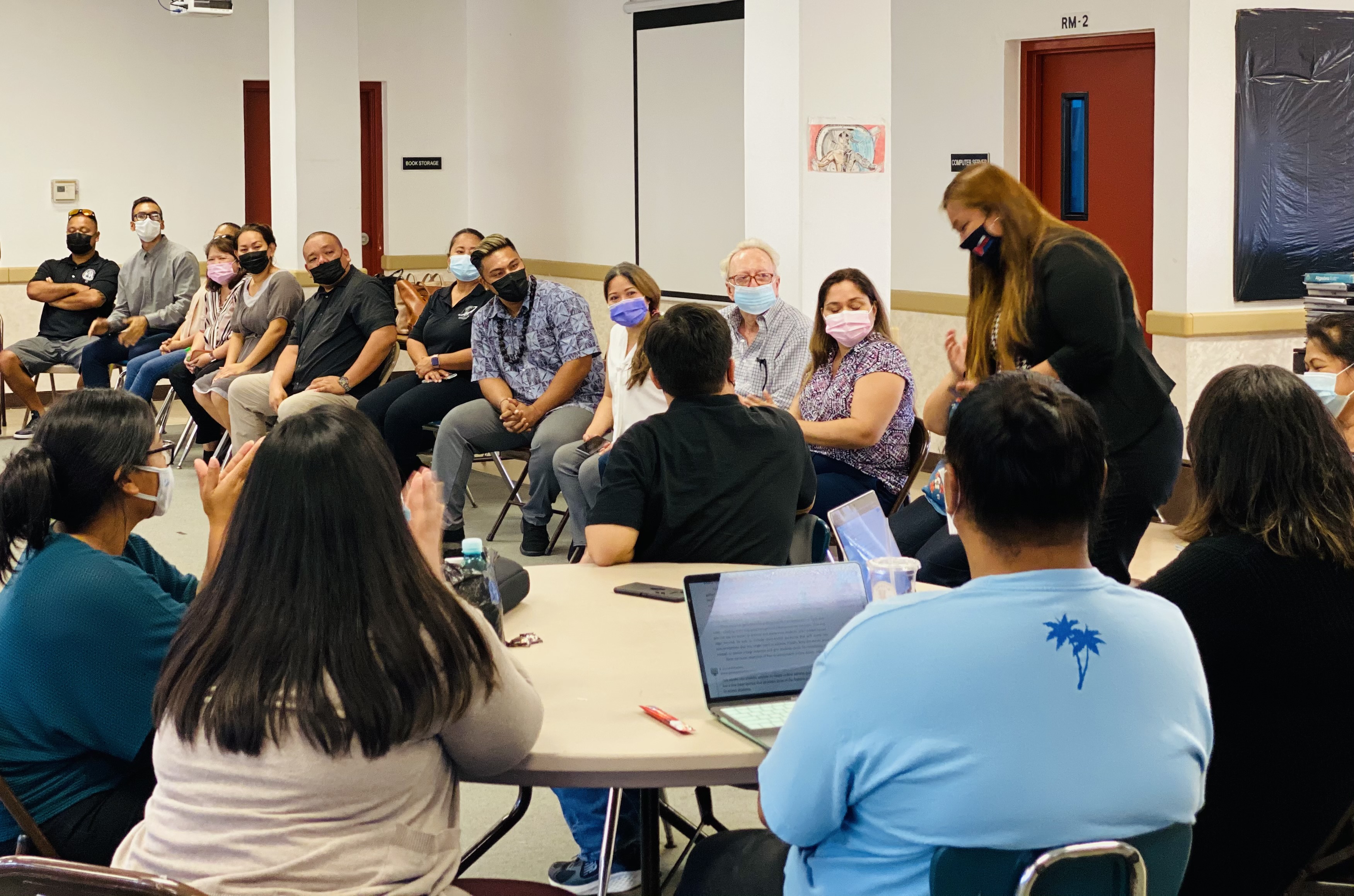 Head Start and Early Head Start Director Lathania Santos answers a question during a meeting with Tinian public education staff.